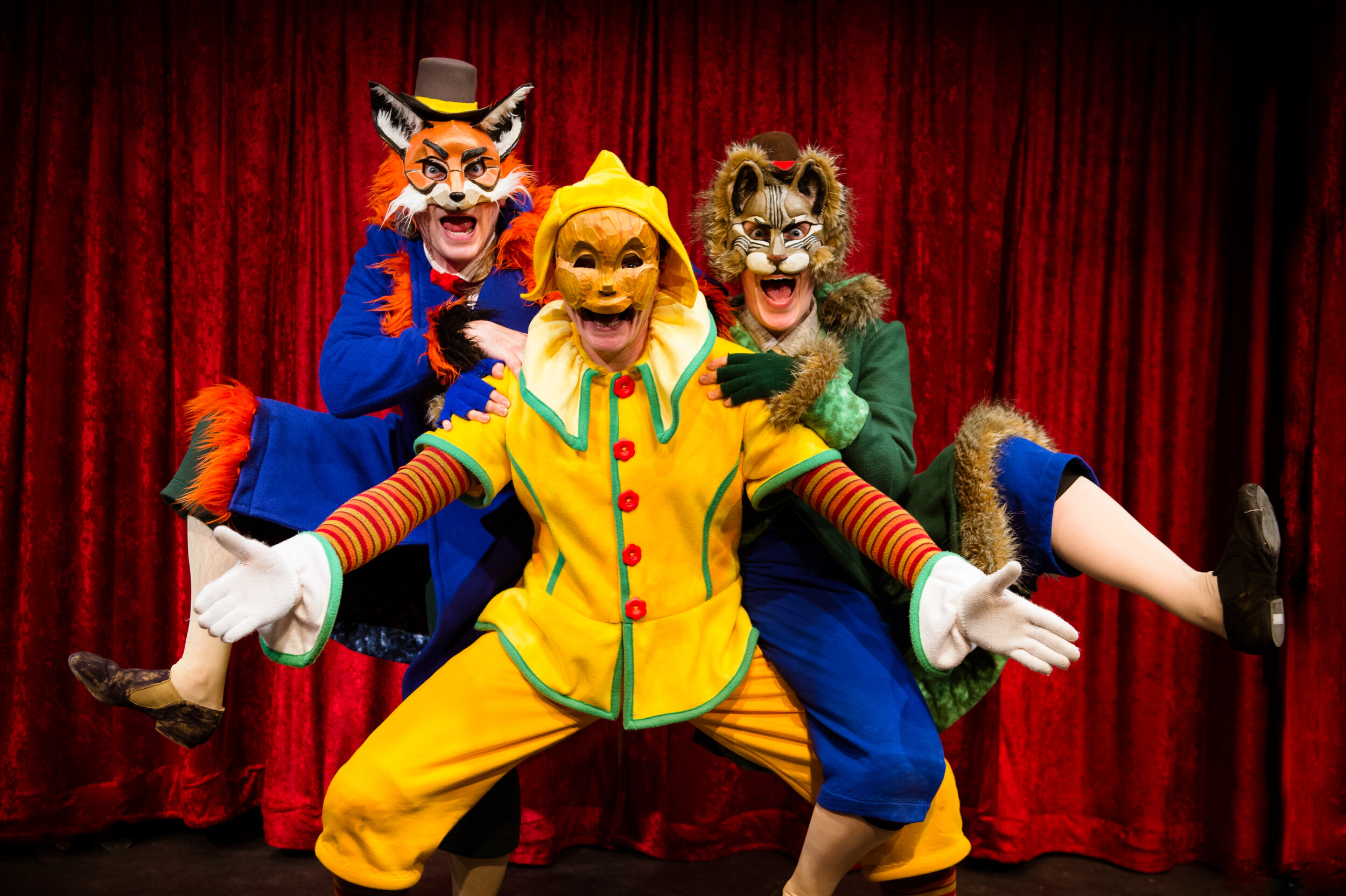  Production photo from  Pinocchio!  Co-produced by Faction of Fools and NextStop Family, March 8 – 30. Costumes by Lynly Saunders, Masks by Waxing Moon Masks, Set Design by Daniel Flint. L to R: Toby Mulford, Jack Novak, and Hannah Sweet. Photo by Tr