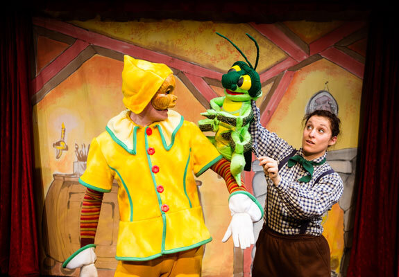  Production photo from  Pinocchio!  Co-produced by Faction of Fools and NextStop Family, March 8 – 30. Costumes by Lynly Saunders, Masks by Waxing Moon Masks, Set Design by Daniel Flint, Puppet Design by Dan Mori. L to R: Jack Novak and Alani Kravitz