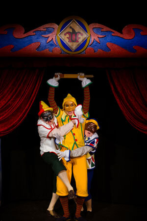       Production photo from  Pinocchio!  Co-produced by Faction of Fools and NextStop Family. Costumes by Lynly Saunders, Masks by Waxing Moon Masks, Set Design by Daniel Flint. Additional Masks by Aaron Cromie. L to R: Toby Mulford, Jack Novak, and 