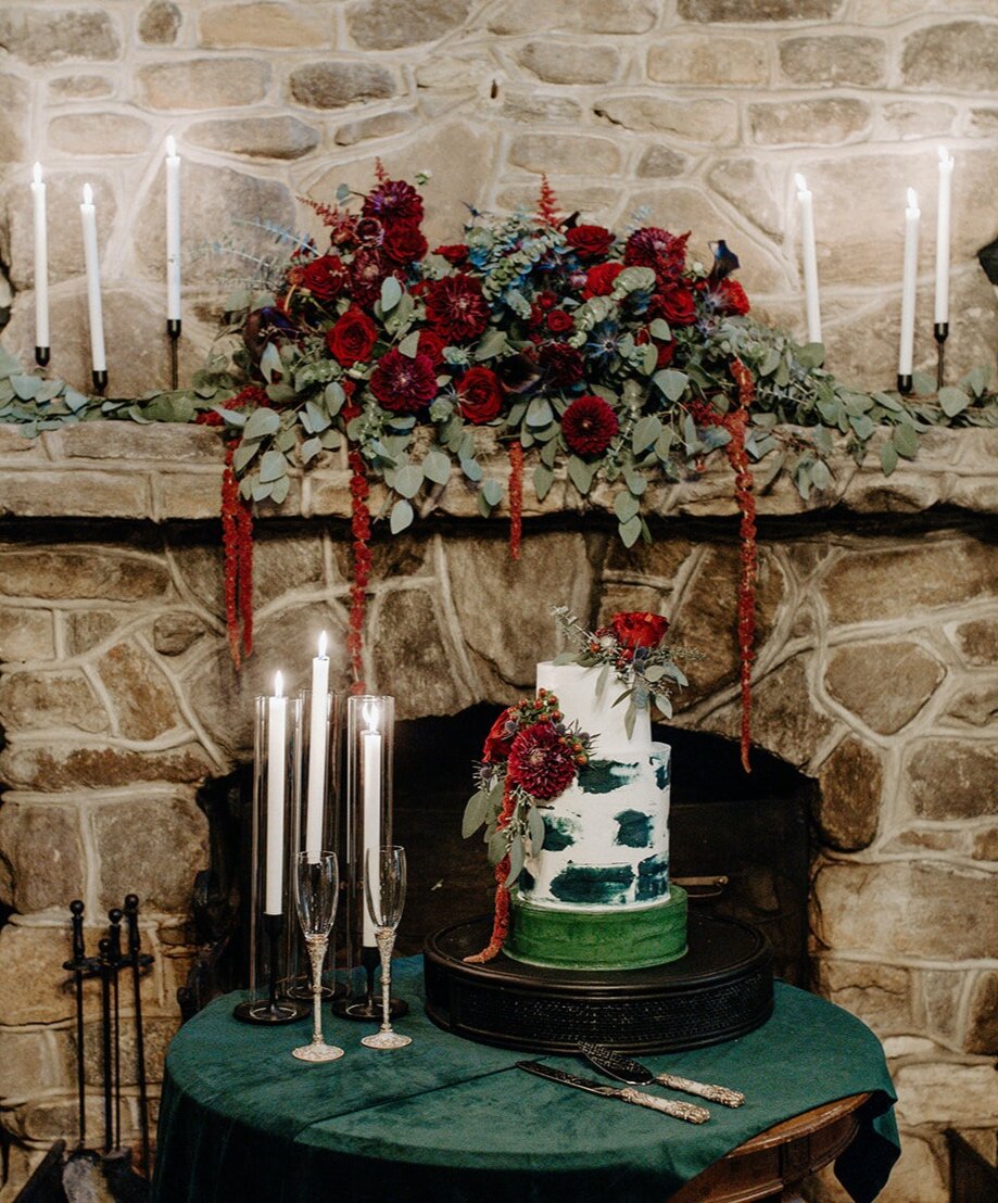 wedding cake micro wedding in front of fireplace