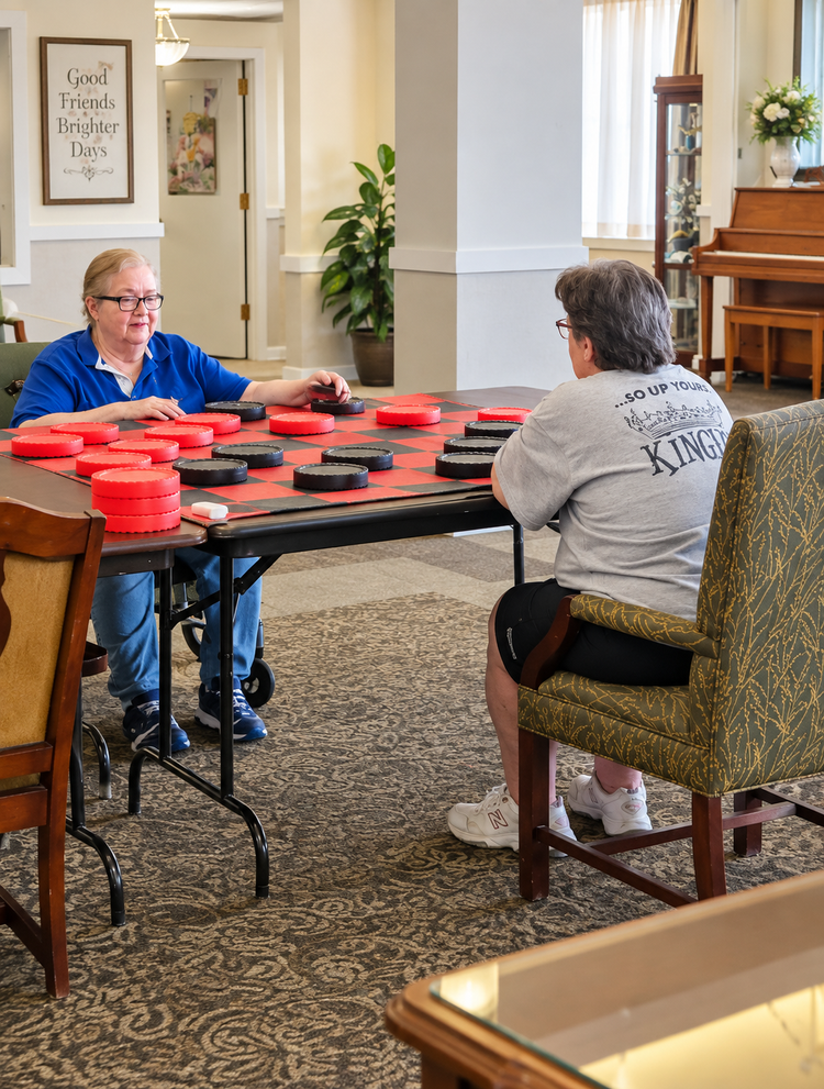 A friendly game of checkers in a comfortable community living space