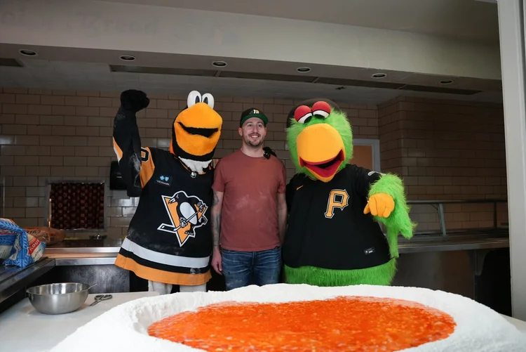 Ryan Peters of Peters Pasta with Pittsburgh Penguins and Pirates mascots during a YouTube production with Orchard Eight Media