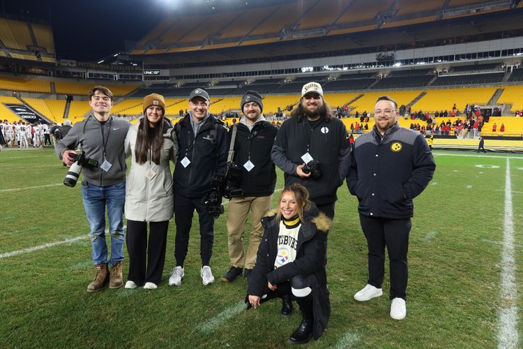 Orchard Eight Media crew on the field at Acrisure Stadium for the Pittsburgh Steelers High School Football Showcase