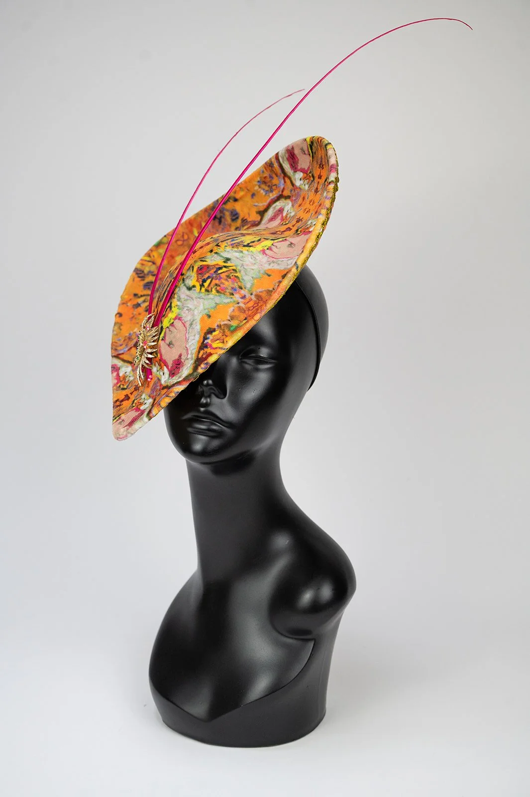 Medium orange velvet hat with quills