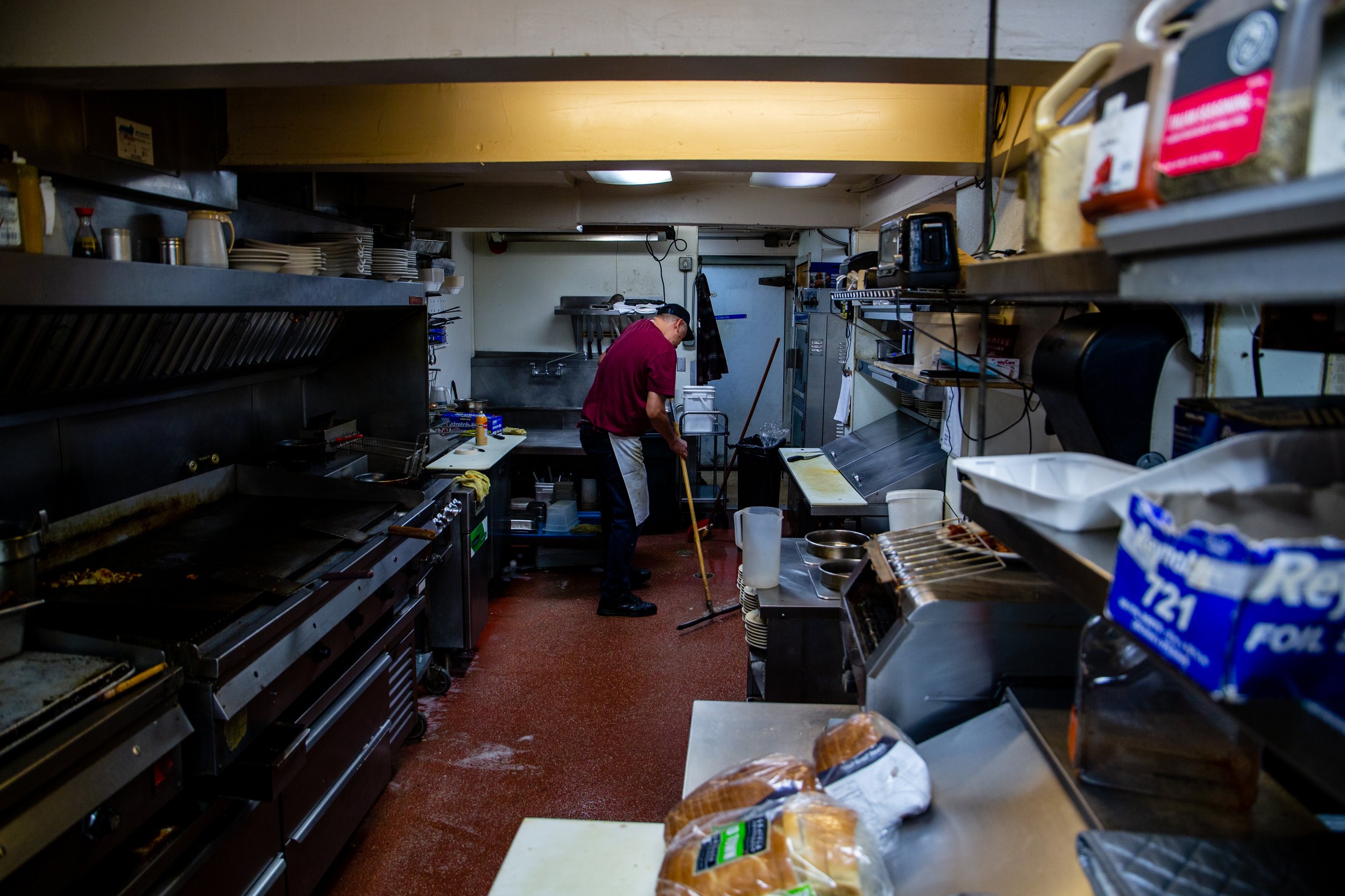 Javier Carrillo cleans the floors of the kitchen shortly after the Glenwood closes for the day. Carrillo has been working at the Glenwood for 26 years, along with his brother, Jorge. The Glenwood Restaurant, a staple in the Eugene community for 38 ye