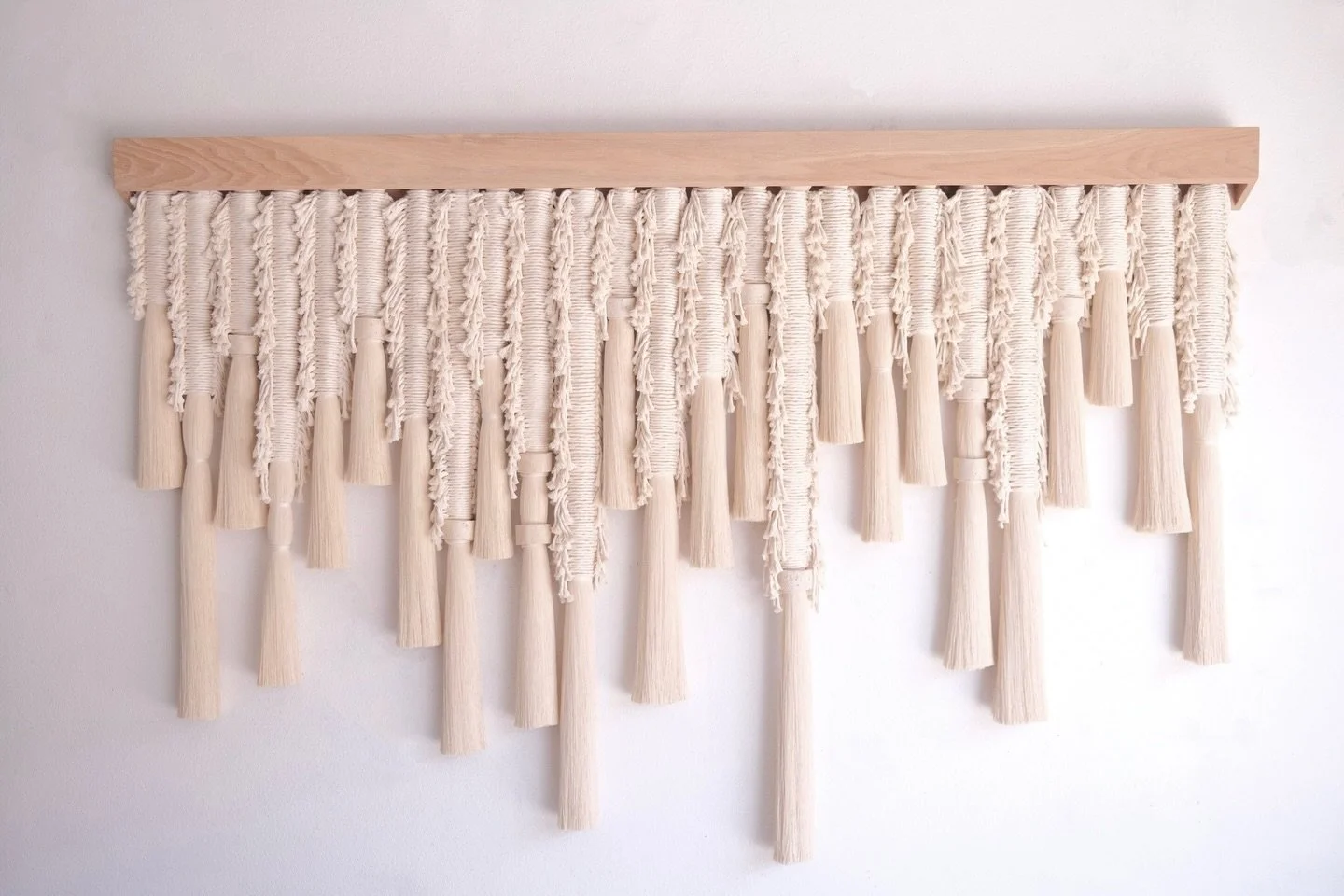 Our latest signature fringe waxed cotton commission measuring 72&rdquo; wide. Scroll to see the artistry behind this sleek wooden sleeve that elevates the art by @jileswoodworks