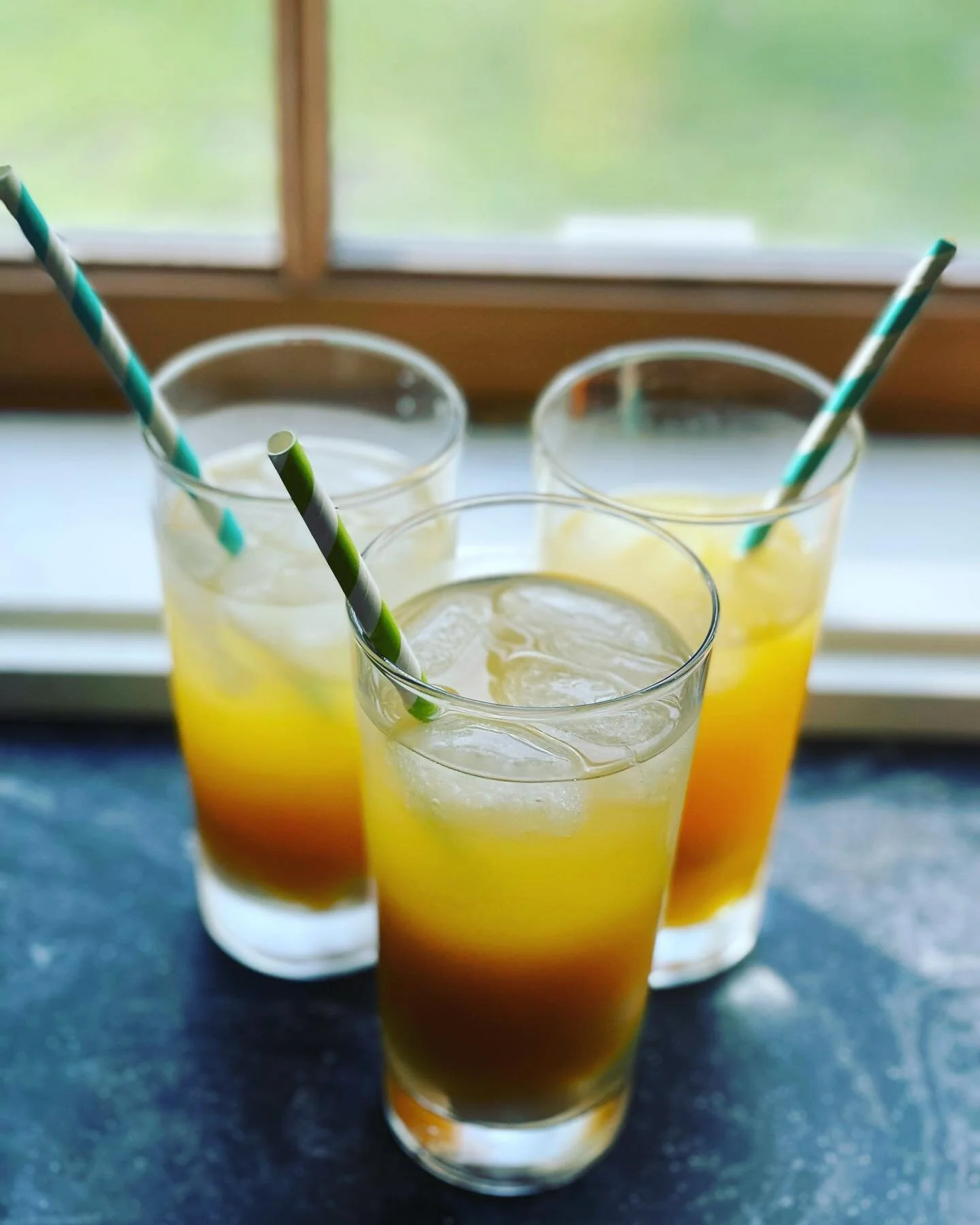 Mango spritzer for a hot summer day.
.
For my own version (less sugar and no alcohol)
1/4 cup of mango purée (sub with 100% fruit mango smoothie at the stores) with 3/4 cup sparkling mineral water and ice. 
.
For the cocktail version I mad