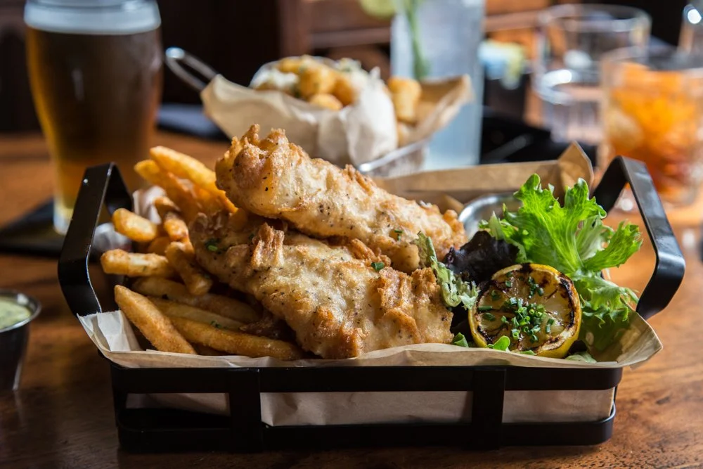 Crispy fish &amp; chips. Classic Irish comfort.

Golden haddock, crinkle-cut fries, and our house-made tartar sauce&mdash;this is the pub staple everyone&rsquo;s talking about in Lancaster. We grill the lemon for a burst of flavor and keep it fresh w