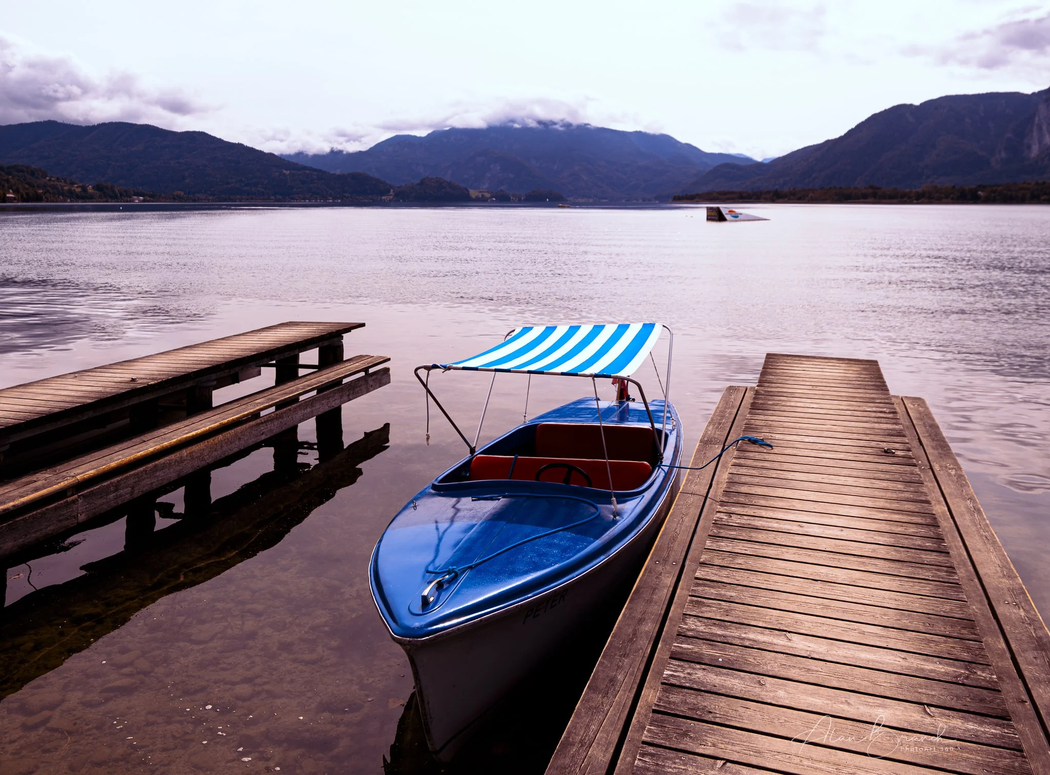 Stop 8 - Lake Mondsee (Moon Lake), a popular destination in the Salzkammergut region bordering Salzburg. Lake Mondsee is a beautiful lake known for its clean, warm waters, surrounding cliffs like the Drachenwand, and activities like swimming, hiking,