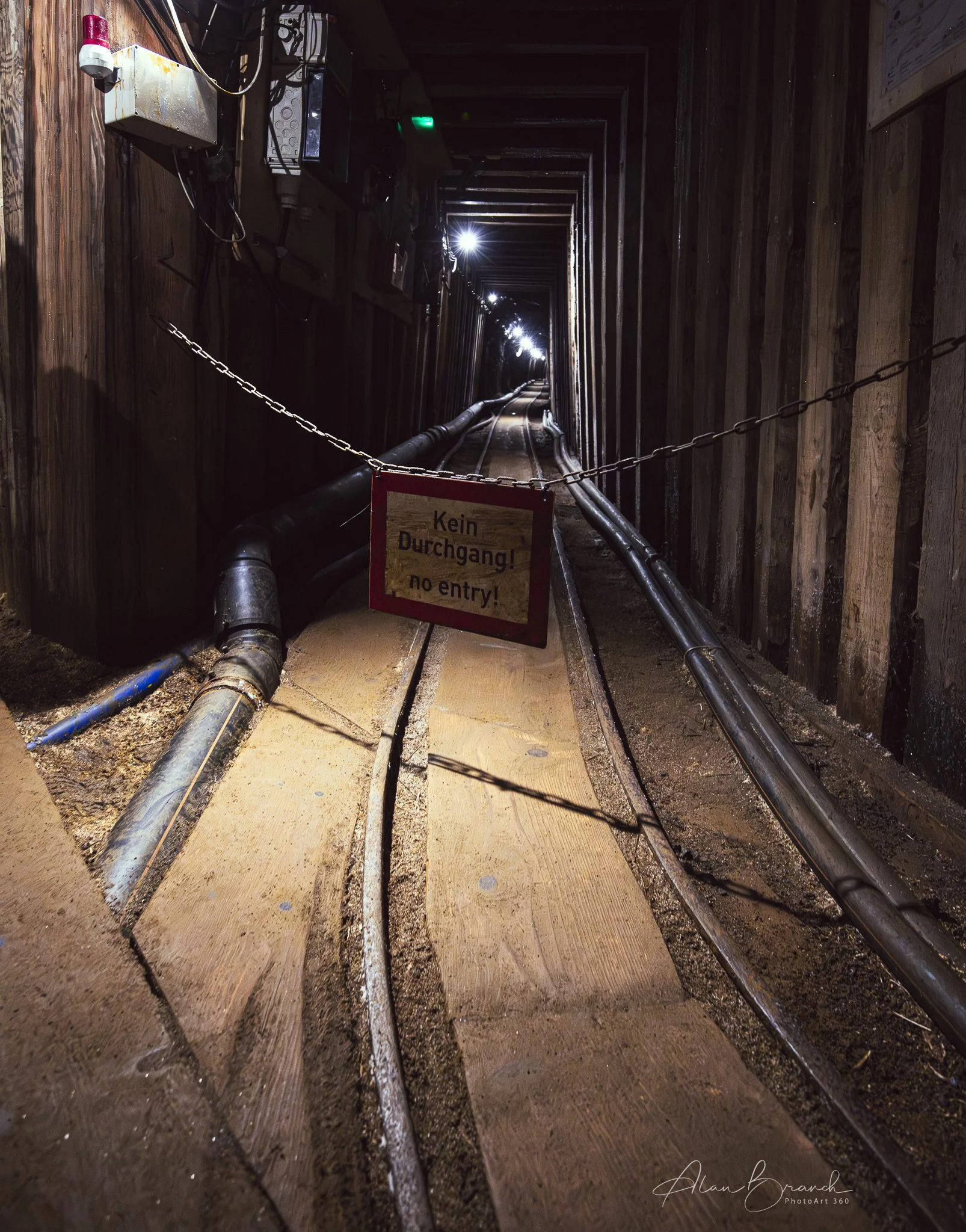 Saltmine tunnel with warning sign