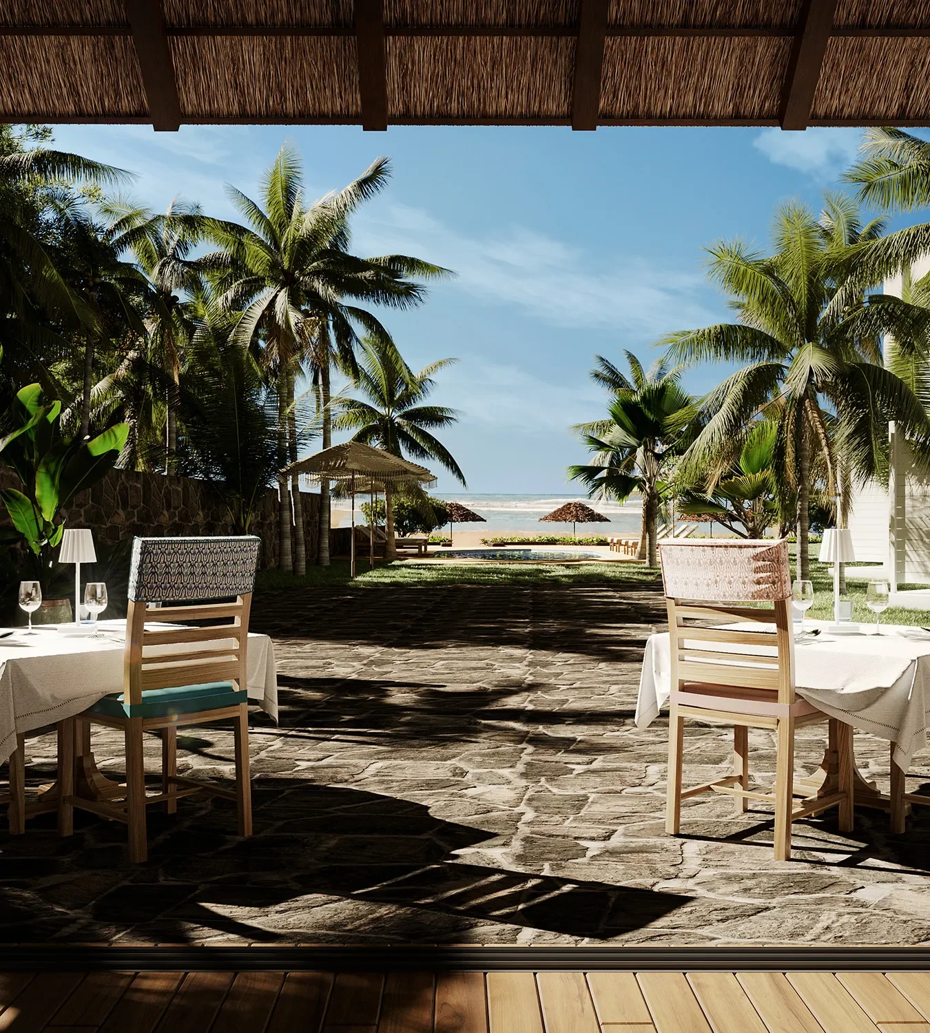 3D rendering of a beachfront restaurant terrace with tropical palm trees and ocean views. Architectural visualization showcases an outdoor dining area with stone flooring, wooden chairs, and thatched shading, designed for a luxury coastal resort.