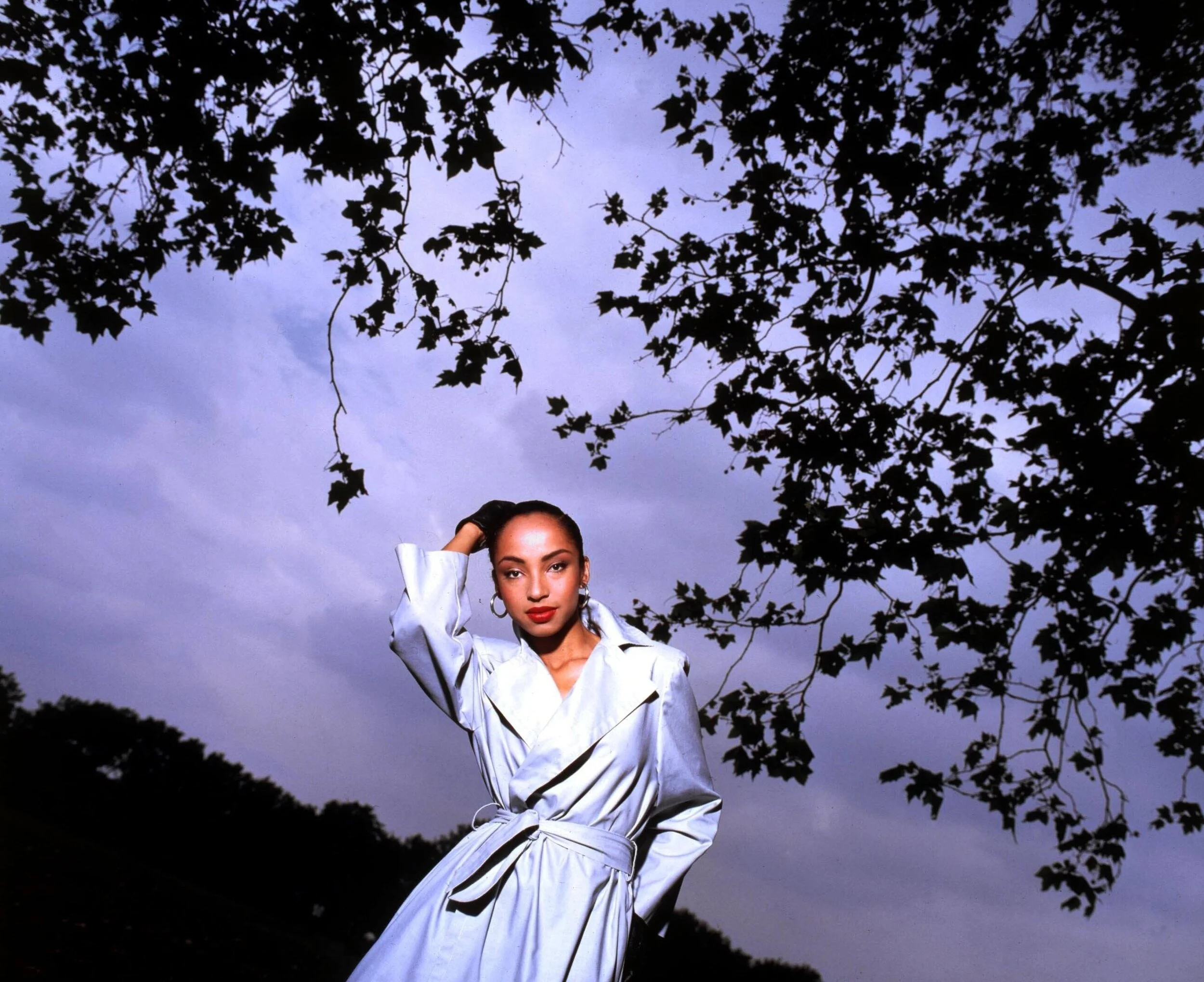 Sade Adu in 1990 photographed by Steve Lyne. Image property of Shutterstock.