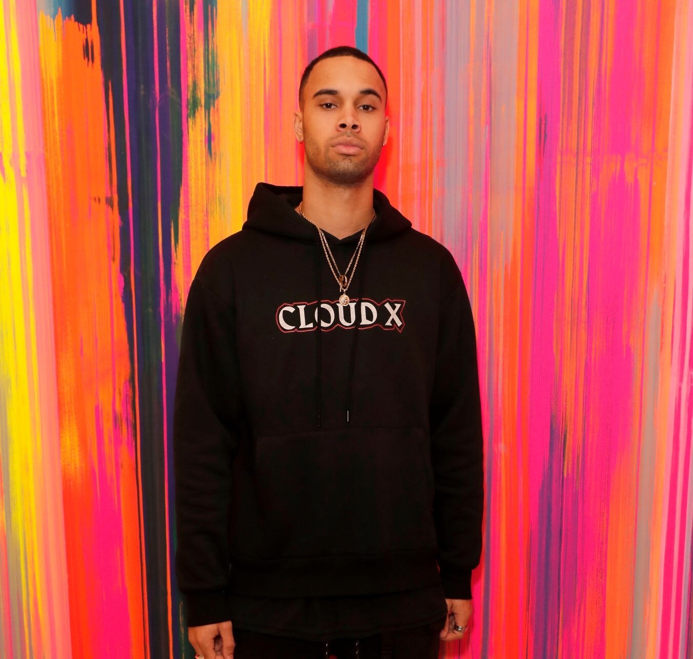 Artist Santino Le Saint wearing the black Cloud X hoodie at the Louis Vuitton New Bond Street Maison Reopening