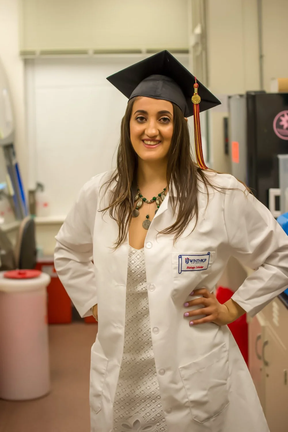  Taking pictures in lab on graduation day where I did my undergraduate research. 