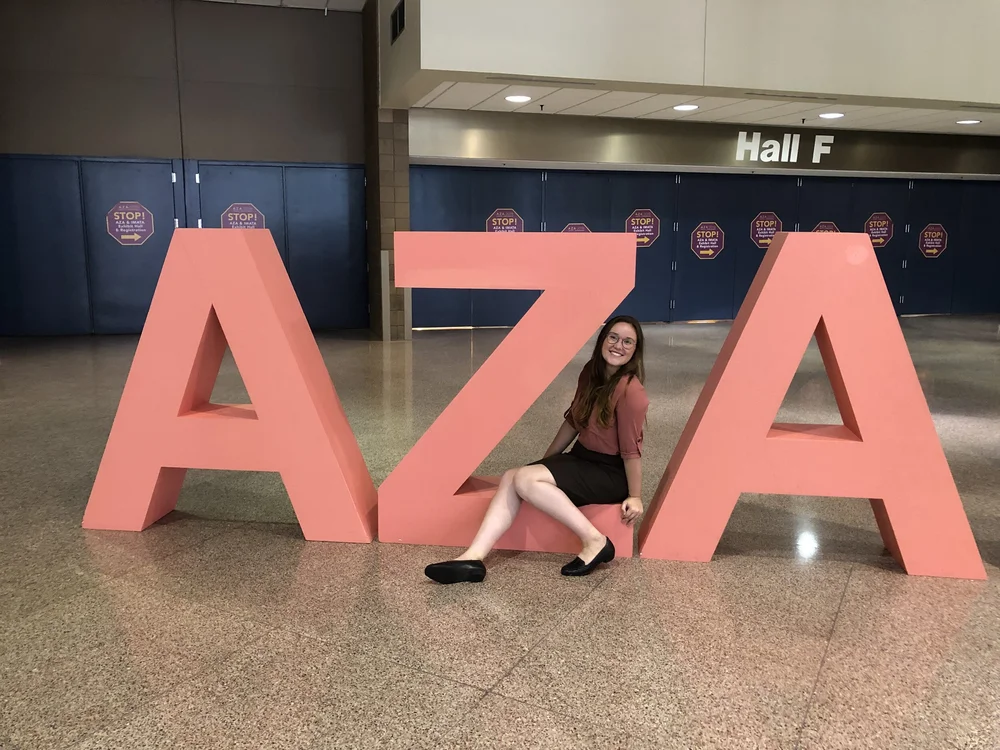  Kylen posing with large novelty AZA letters at 2019 AZA Annual Conference in New Orleans 