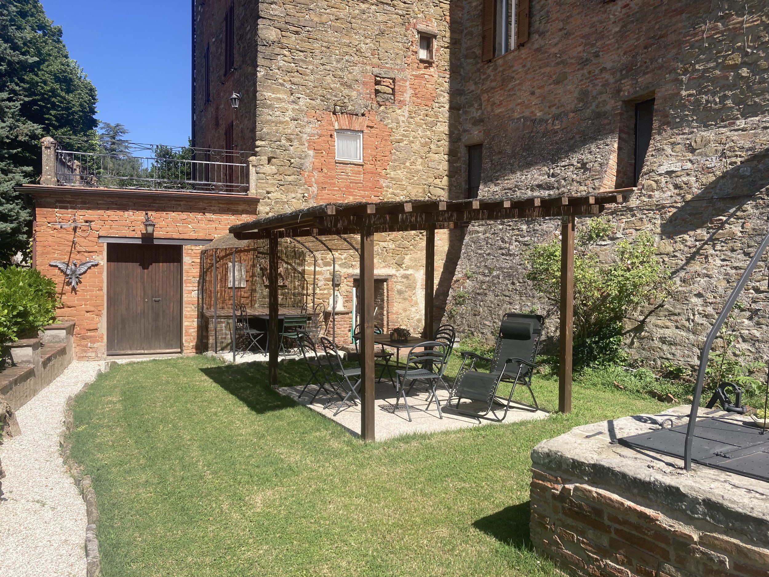 The garden with the defense wall from the XIII century