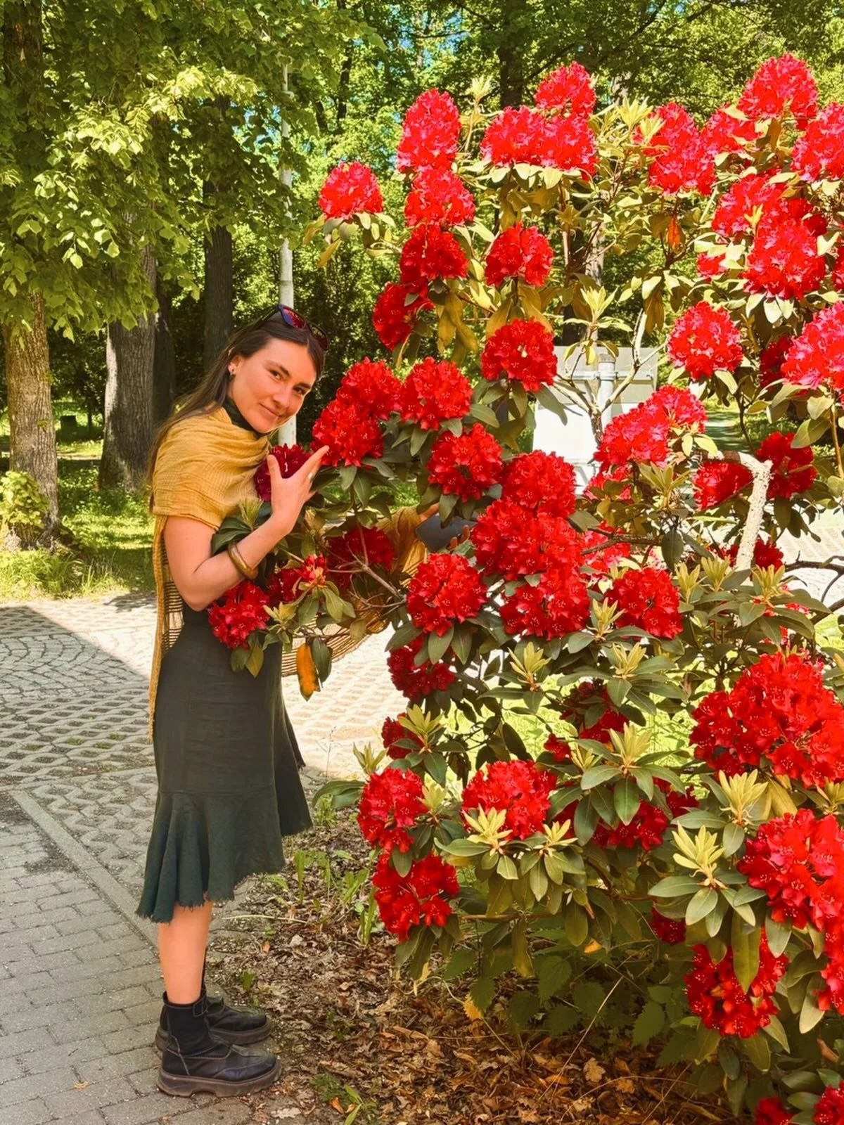 What does the goddess say about me smelling flowers at the place I was born? 
What does she say about the return of my body to this place? What does she say about me recognizing where I come from and what it means that I am here in this form? 

retur