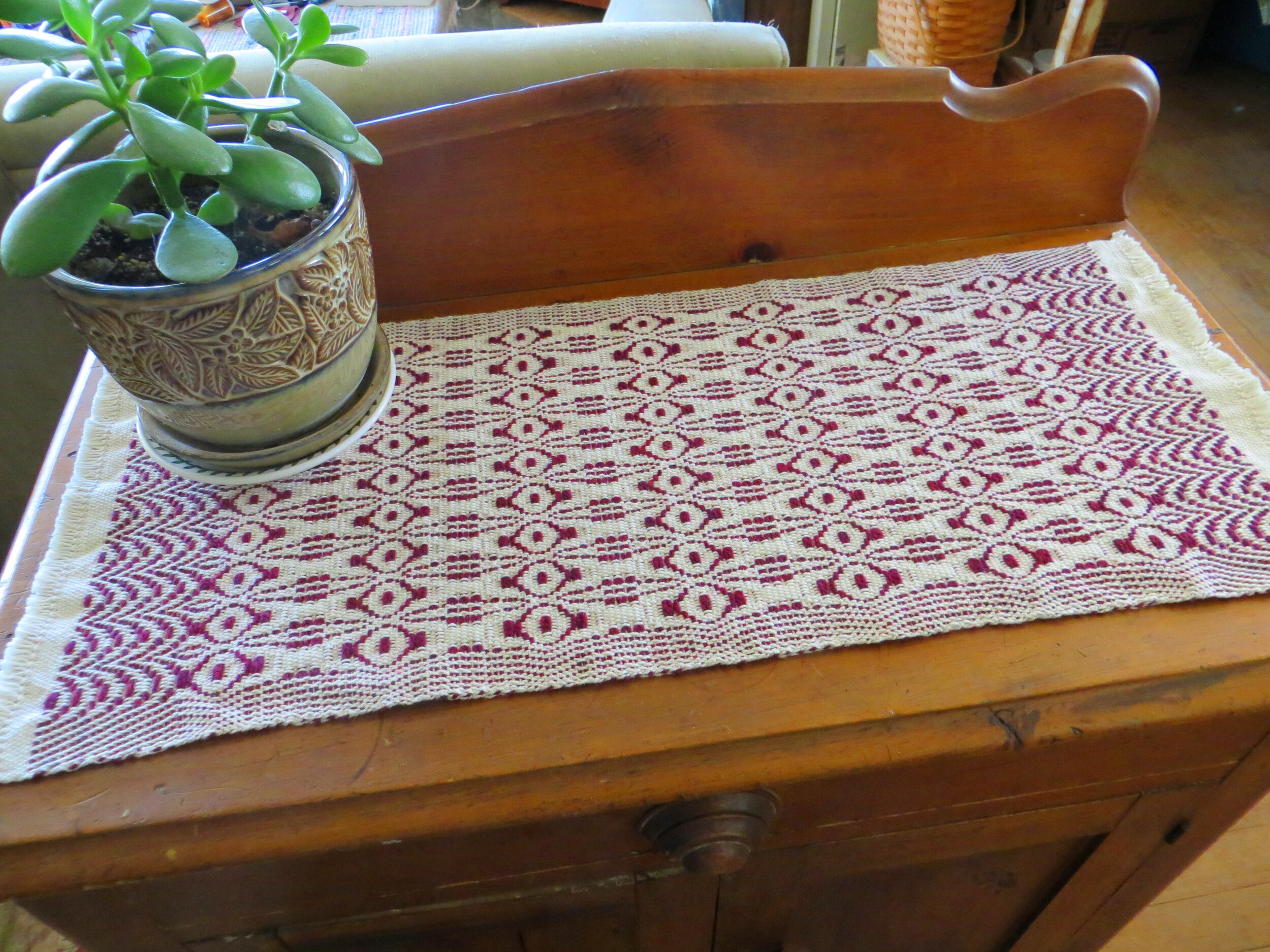 Burgundy runner with plant.jpg