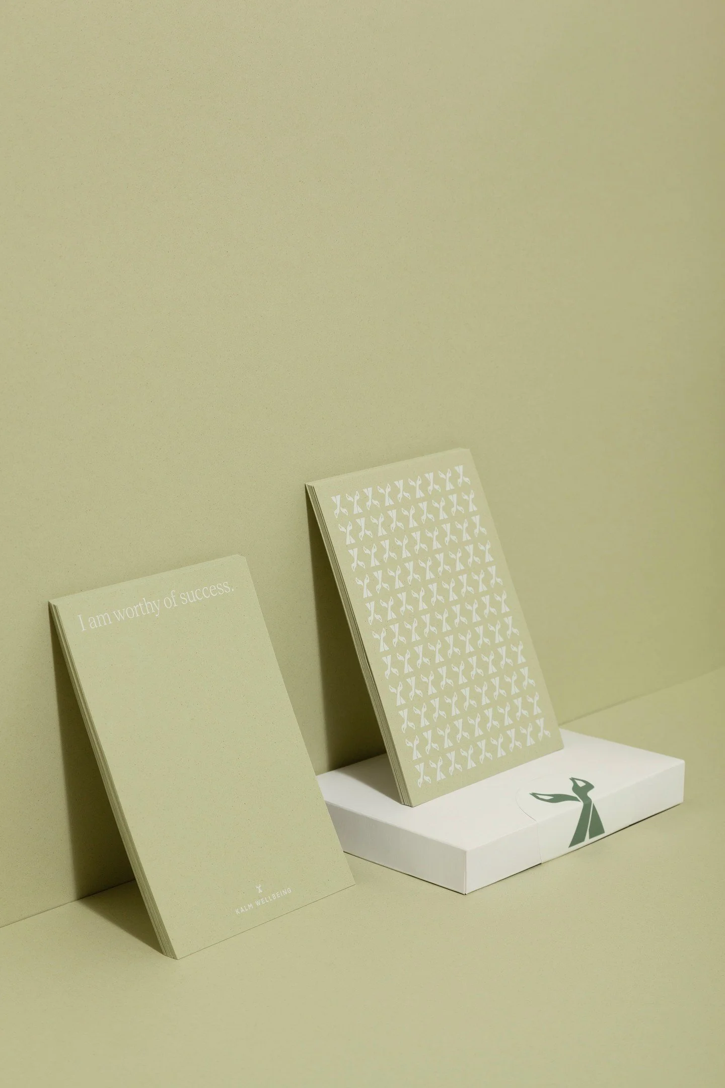 Starting my winter mornings with my KALM WELLBEING affirmation cards with a warm drink sets a positive tone for the day. 

The cards are made from recycled kiwi, giving them the calming sage green colour, and each affirmation is designed to uplift yo