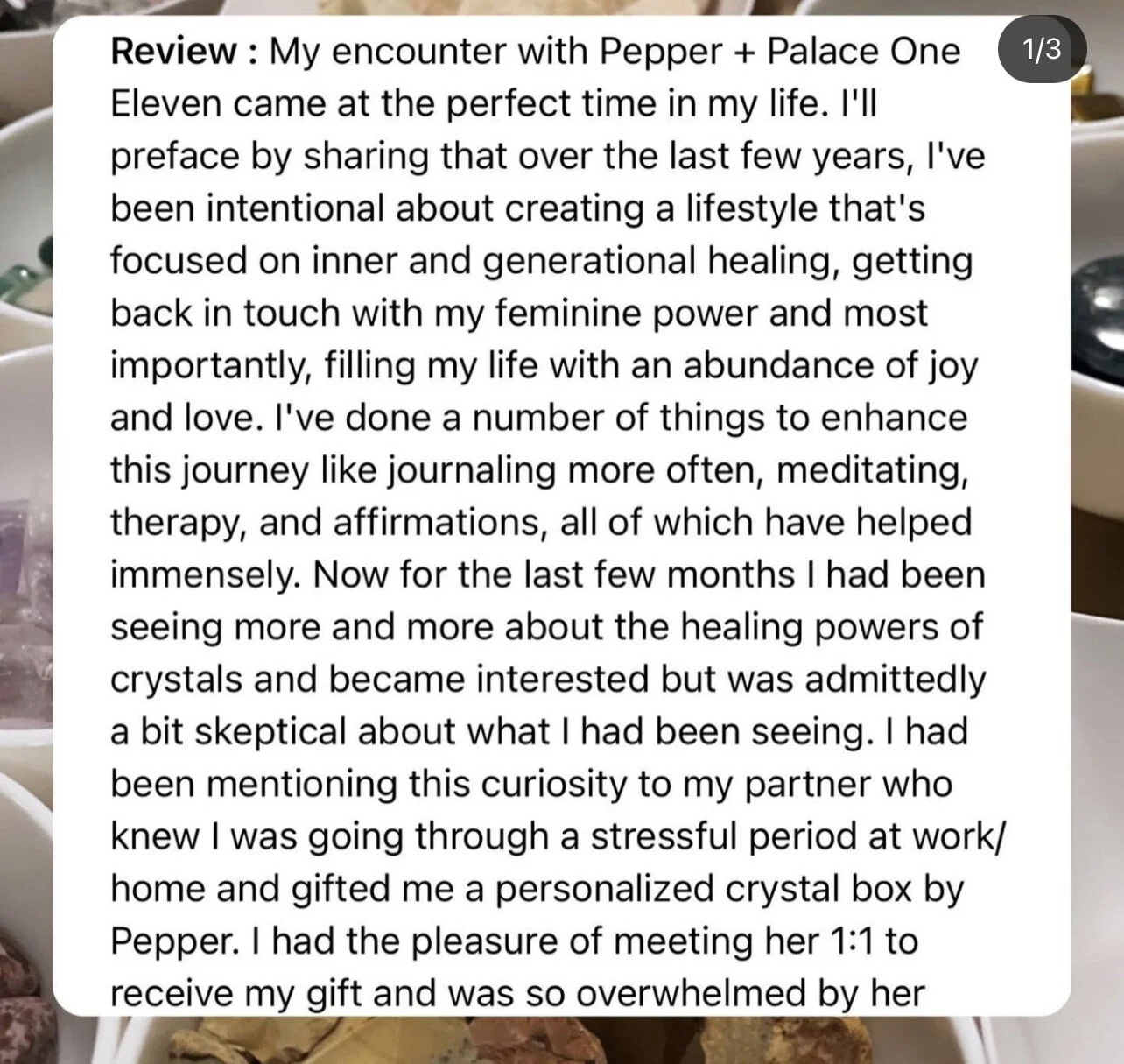 Close-up of a review about personal experiences with healing crystals and a gift from Pepper, mentioning emotional growth and healing powers of crystals.