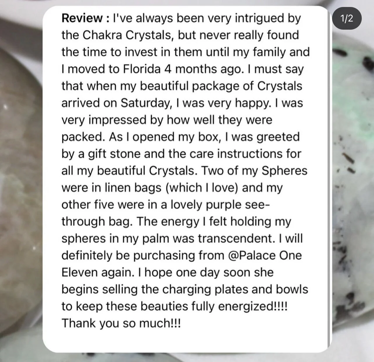 A partially visible package or box with a handwritten review about chakra crystals, mentioning how well packed and beautiful the crystals are, and describing the contents including various spheres and bags.