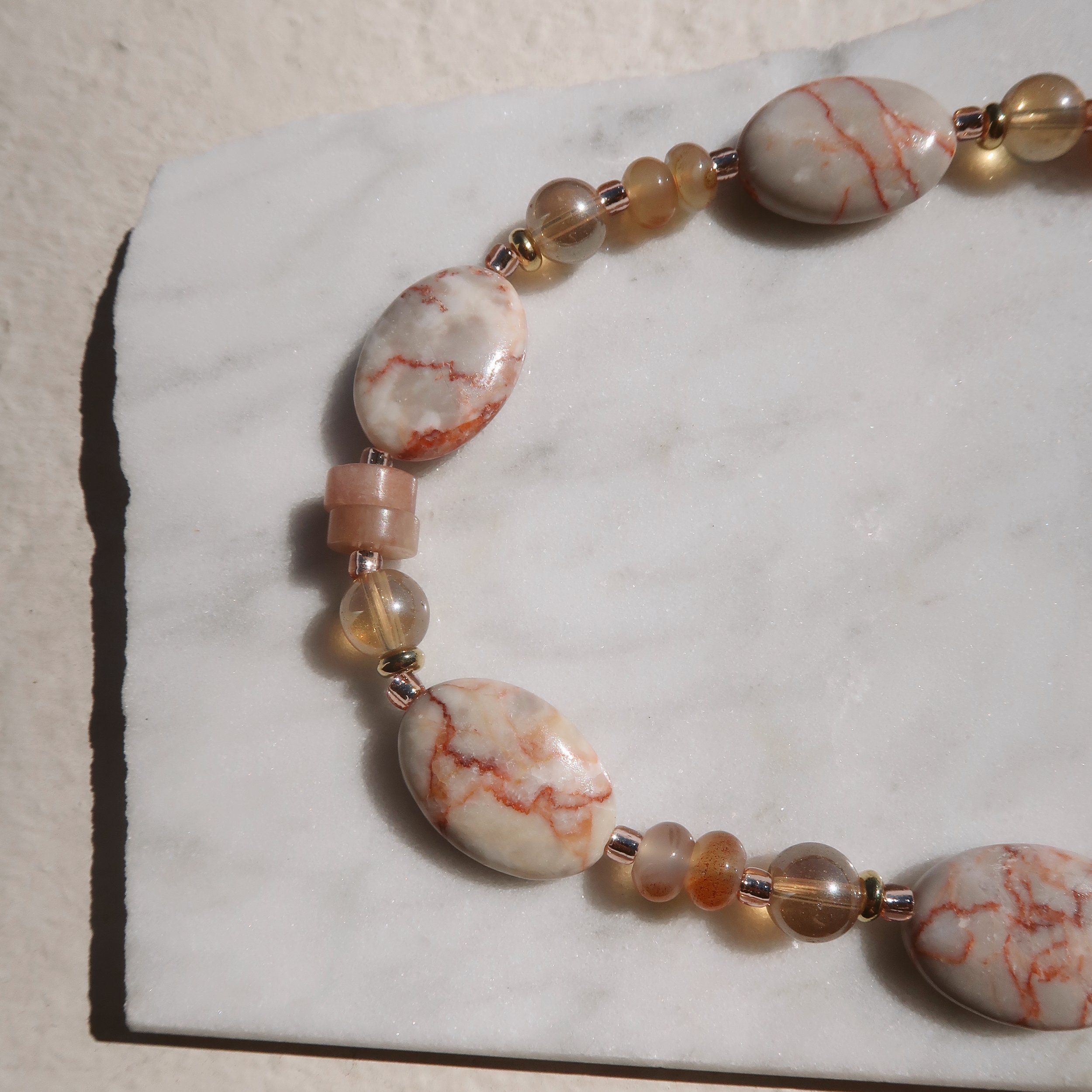 SunsetRedlineBackDetailonMarble.JPG