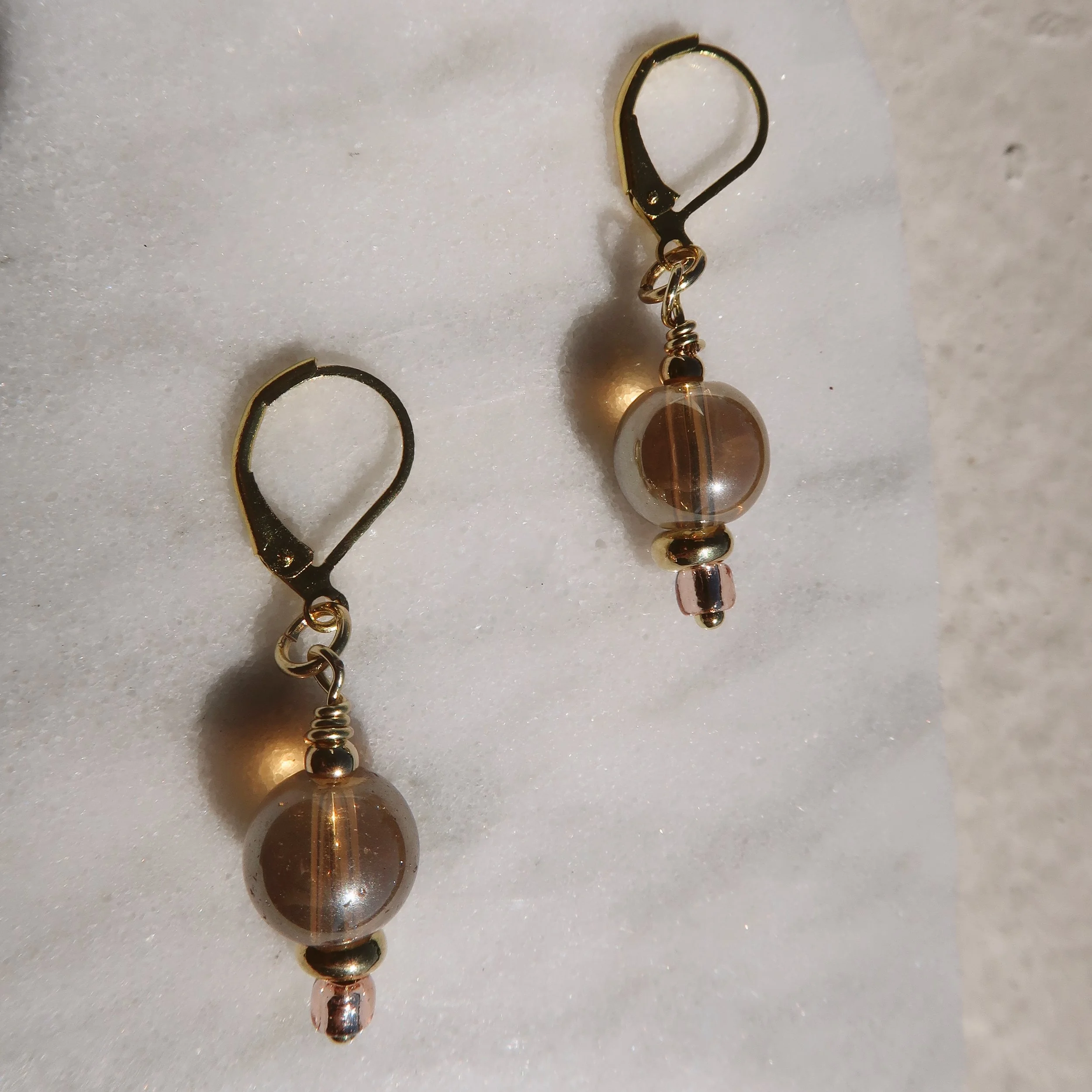 ChampagneEarringsCloseuponMarble.JPG