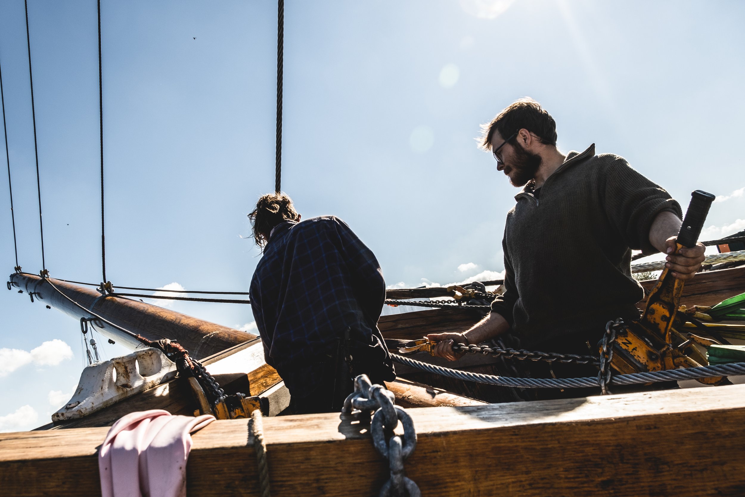 11. VEGA crew members Collin Bertron and Gero Jonas rigging up the bowsprit after it has been fixed in place - photo by Pablo Hellmund, SAILCARGO INC_.jpg