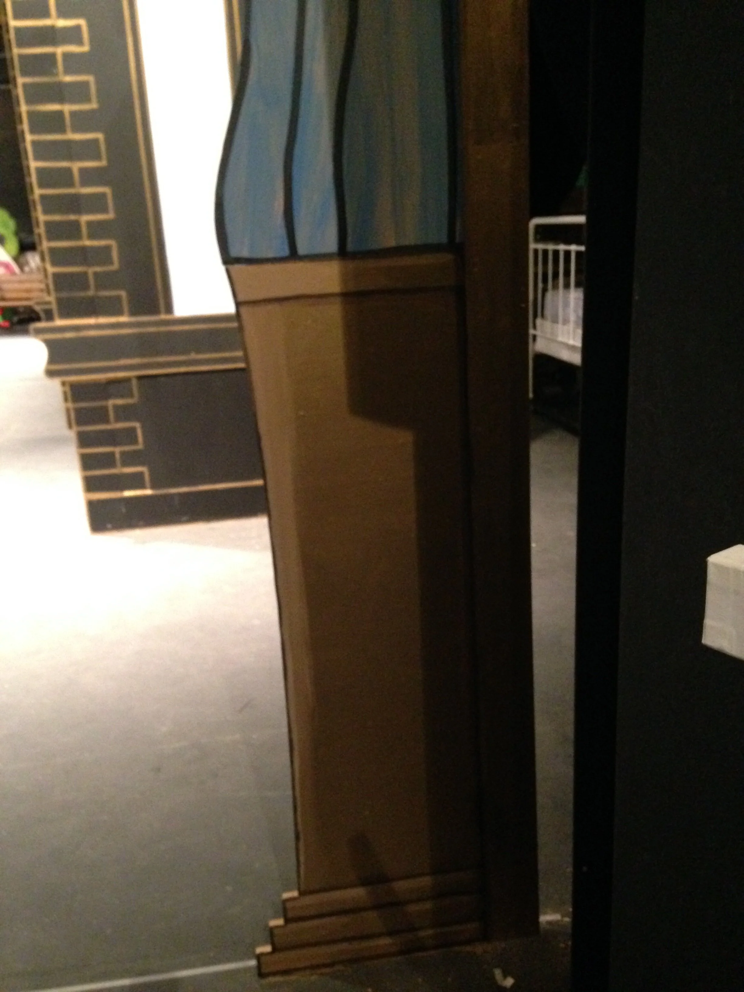 Lower false proscenium paint