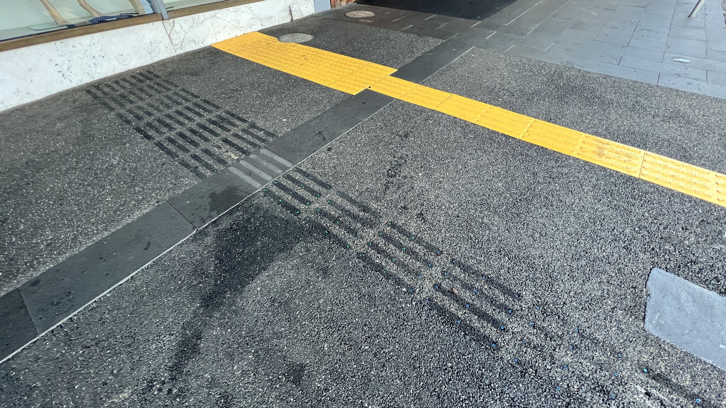 Disused TGSIs removed from bus stop upgrade - Staebl Academy_IMG_4193.JPG