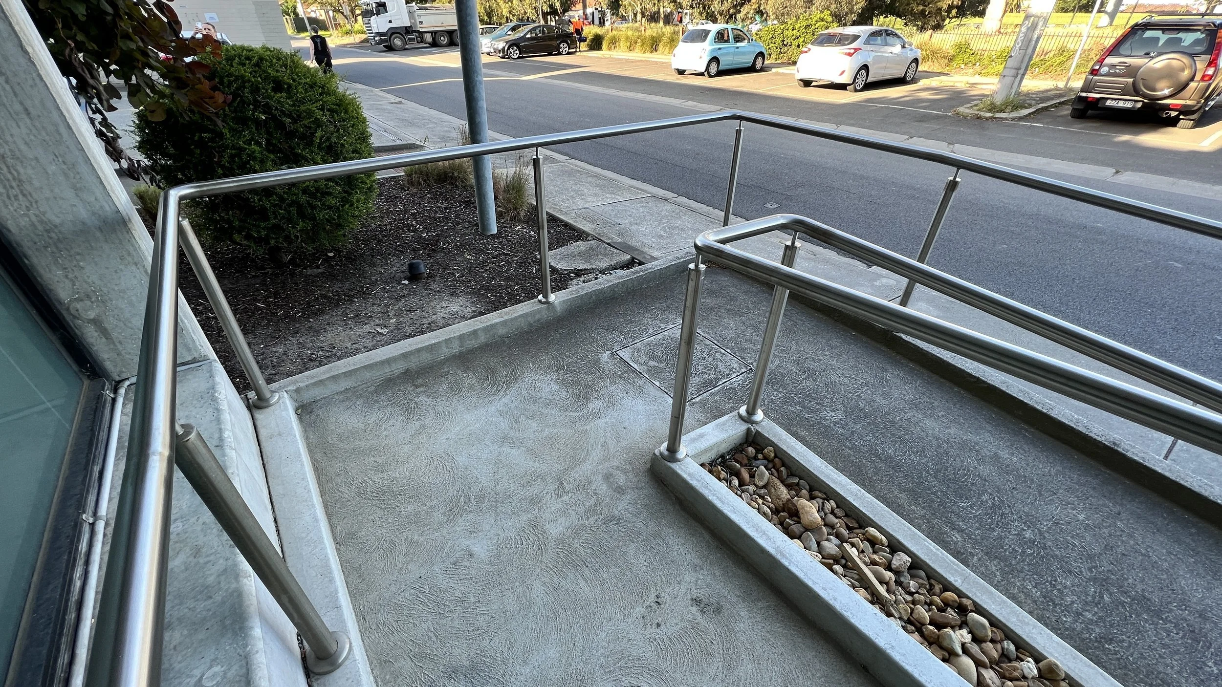 Continuous handrails on landings remove TGSIs - Staebl Academy_IMG_3703.JPG