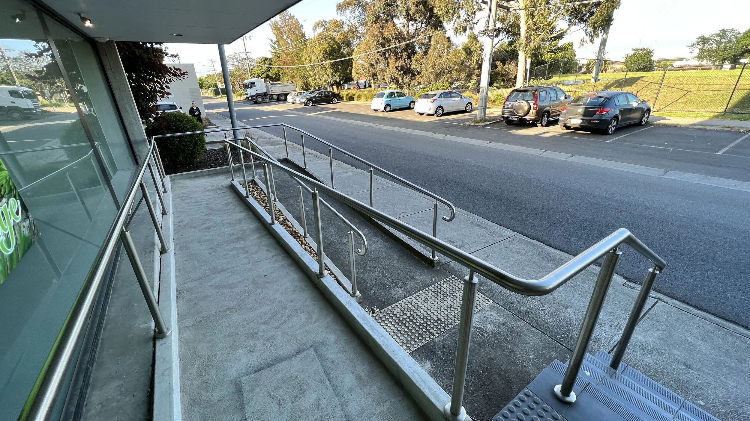 Continuous handrails on landings remove TGSIs - Staebl Academy_IIMG_3704.JPG