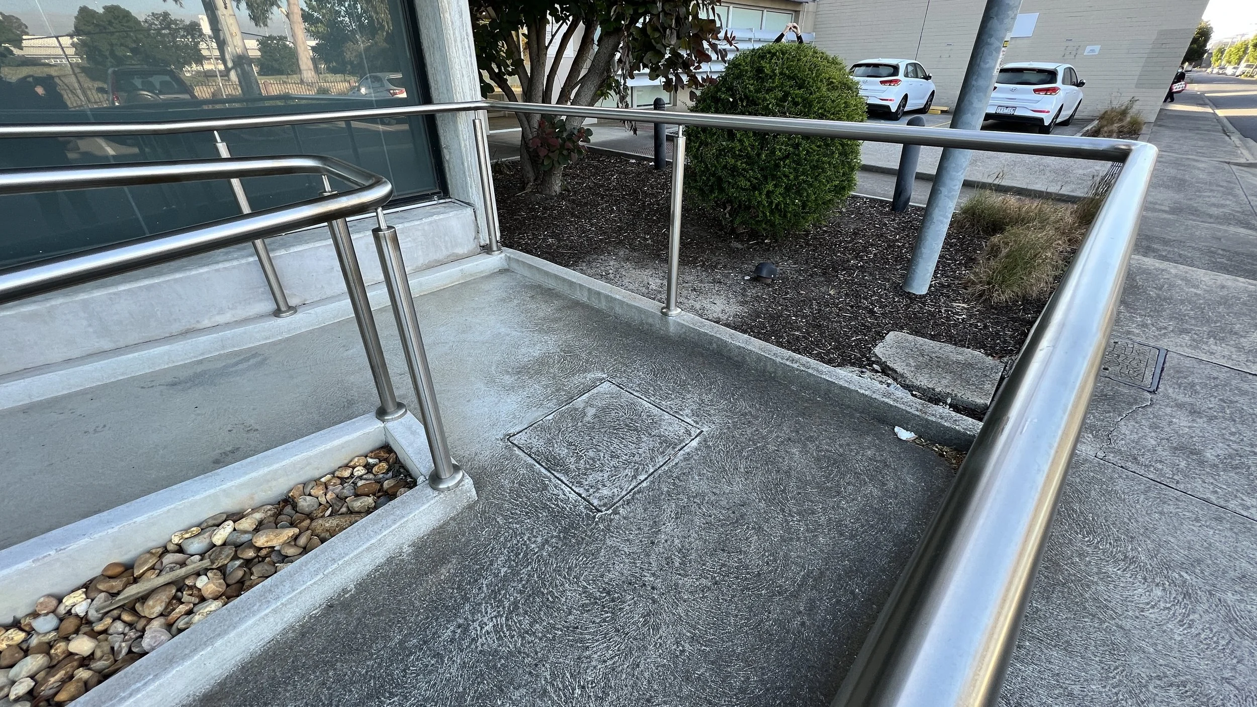 Continuous handrails on landings remove TGSIs - Staebl Academy_IMG_3700.JPG