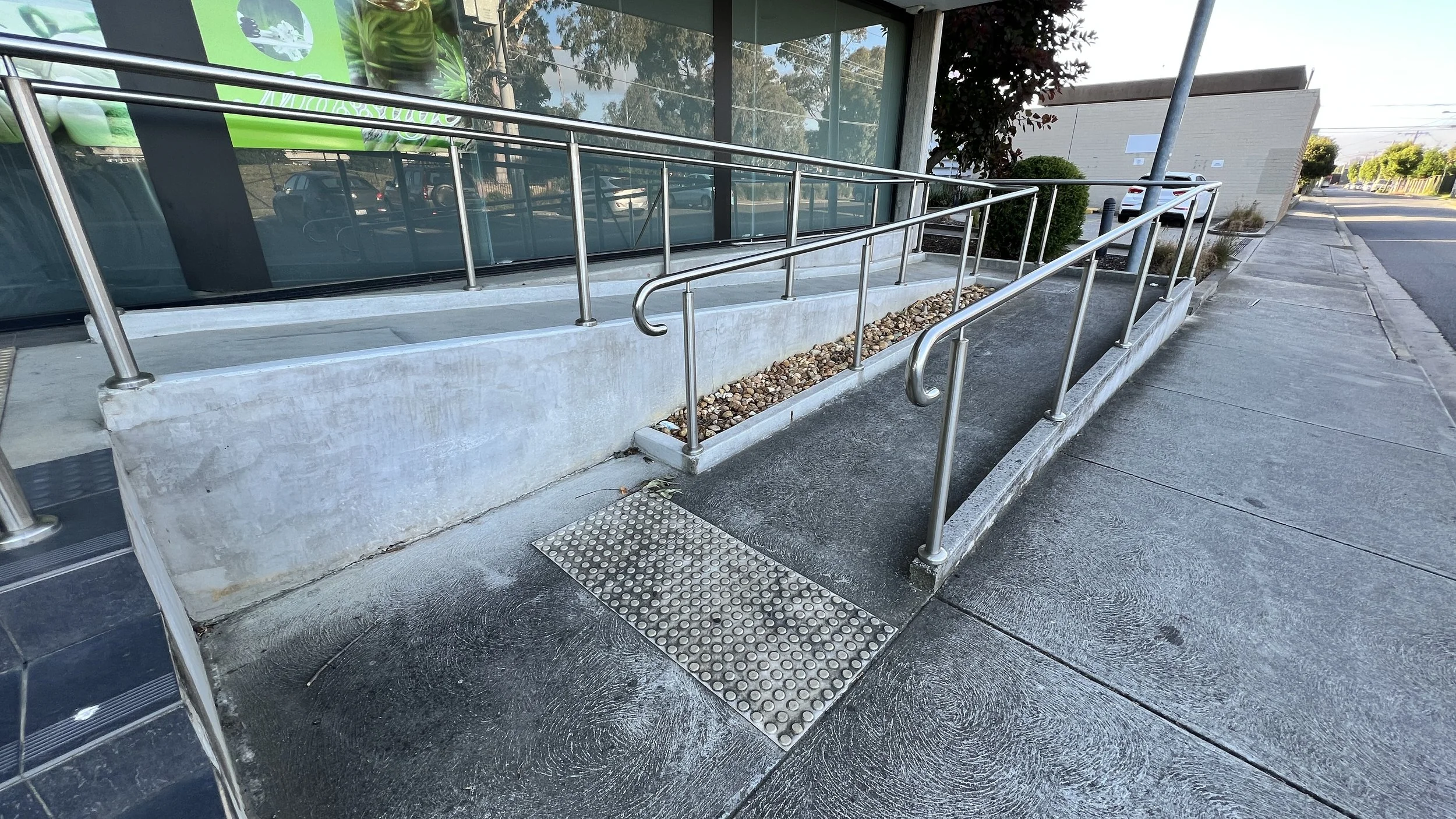 Continuous handrails on landings remove TGSIs - Staebl Academy_IMG_3701.JPG