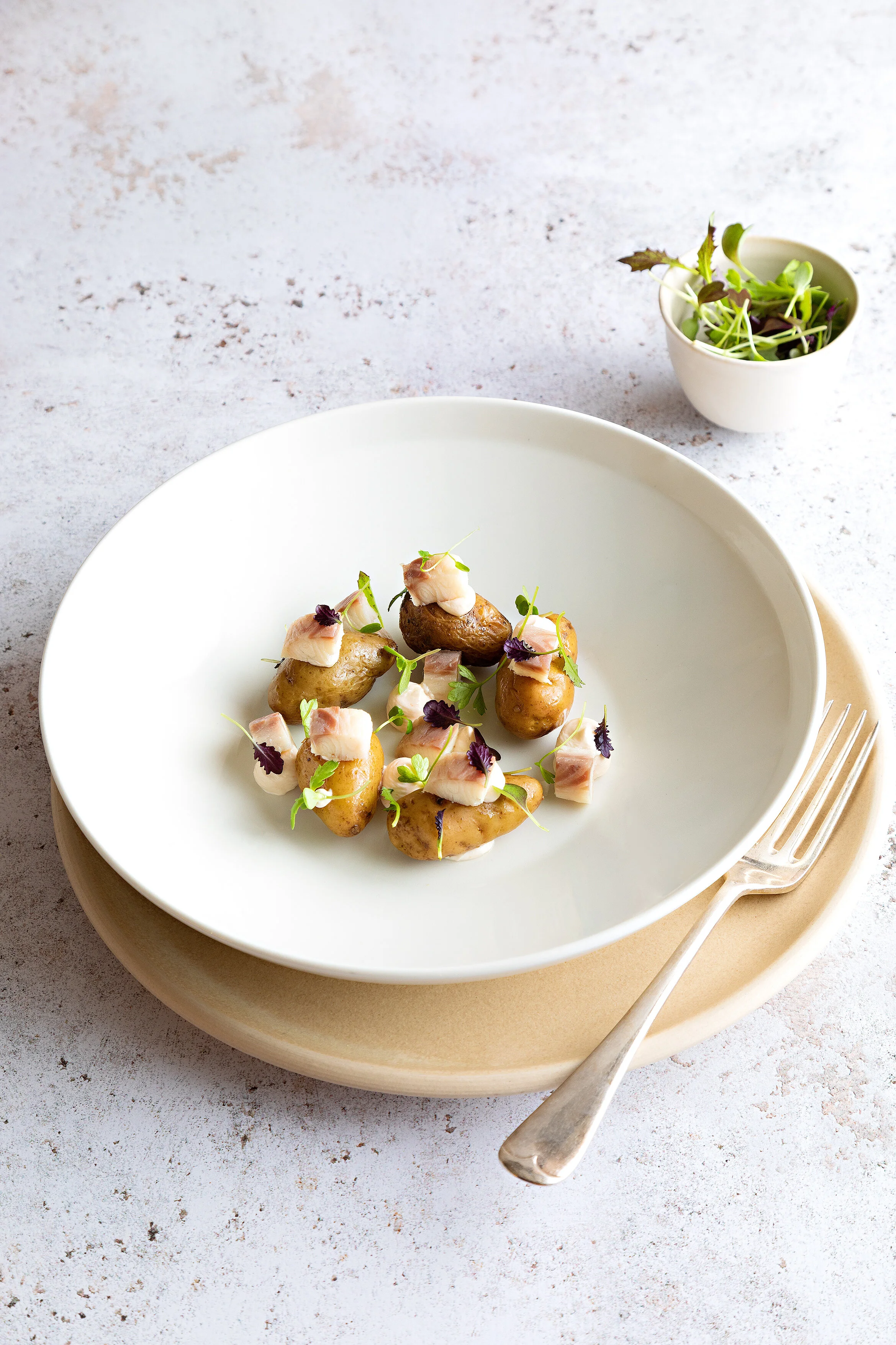 nkc_SimonRoganatHome_Starter_JerseyRoyalPotatoesSmokedEelWhippedCodsRoeParsley_01.jpg