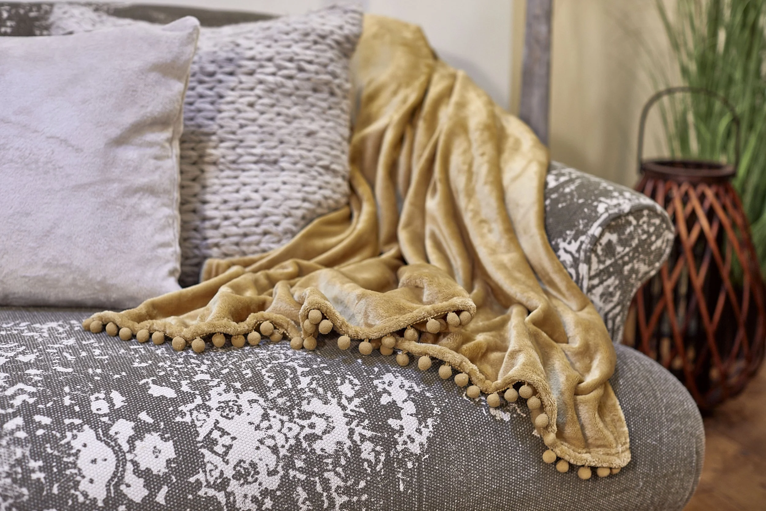 Furniture life style photography, advertisement photograph of Tetrad sofa with decorative throw, cushion and home accessories by Victoria Cook photography