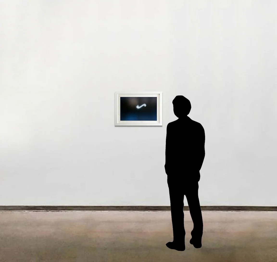 Tacita Dean’s 15-color screenprint, 'Eclipse Drawings #2', shown here framed and to scale alongside a six foot tall figure.