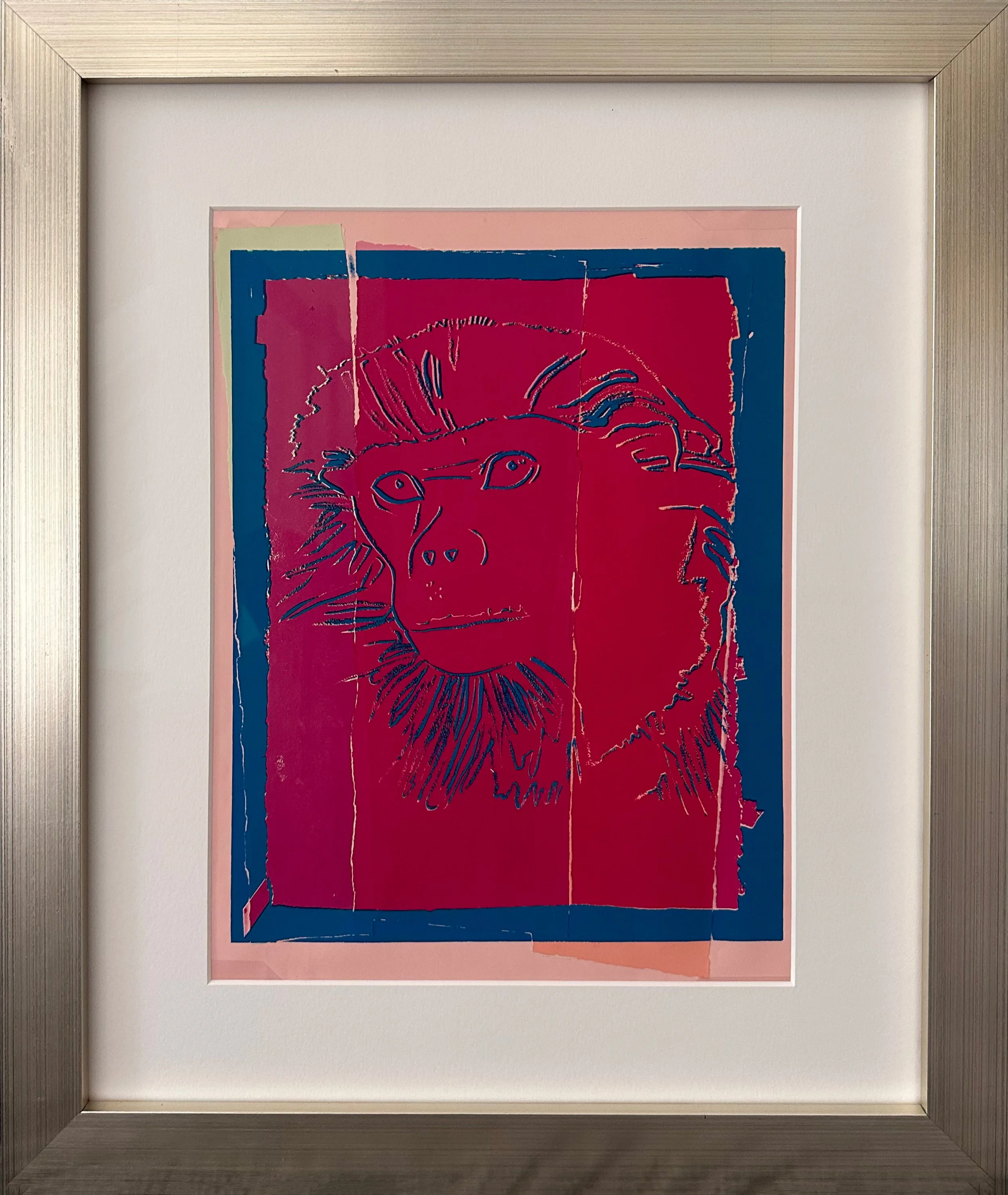 Andy Warhol’s silkscreen inks and colored paper collage on colored paper work, 'Douc Langur'. The work is shown here in a metallic frame.