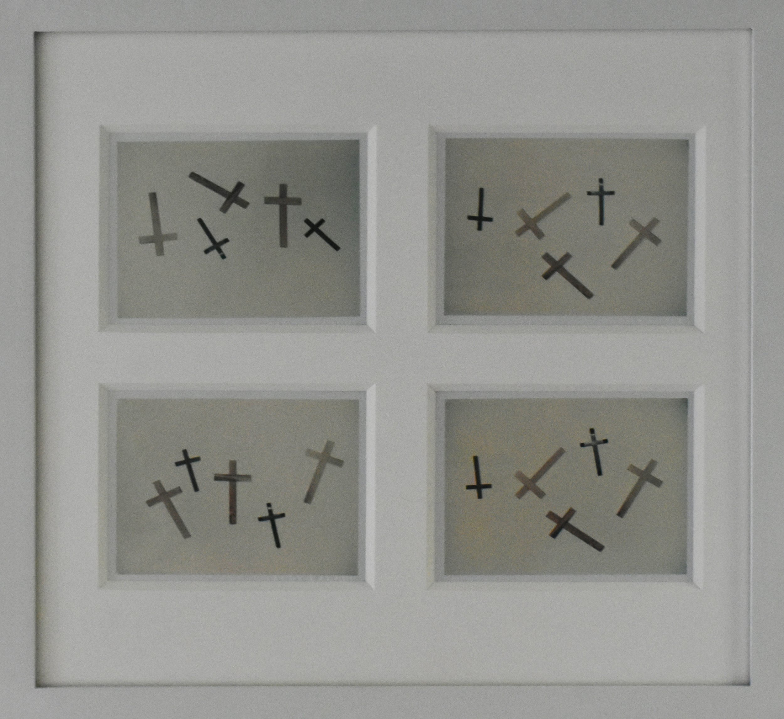 Andy Warhol’s unique Polaroid prints, 'Crosses', shown framed as a group.