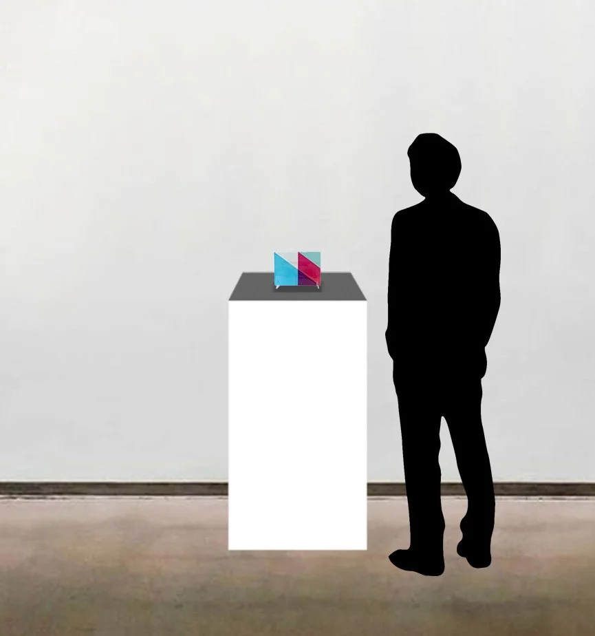 Fiona Grady’s handcut and fused glass panel work, 'Intersection III', shown here to-scale on a white pedestal near a six foot tall figure.