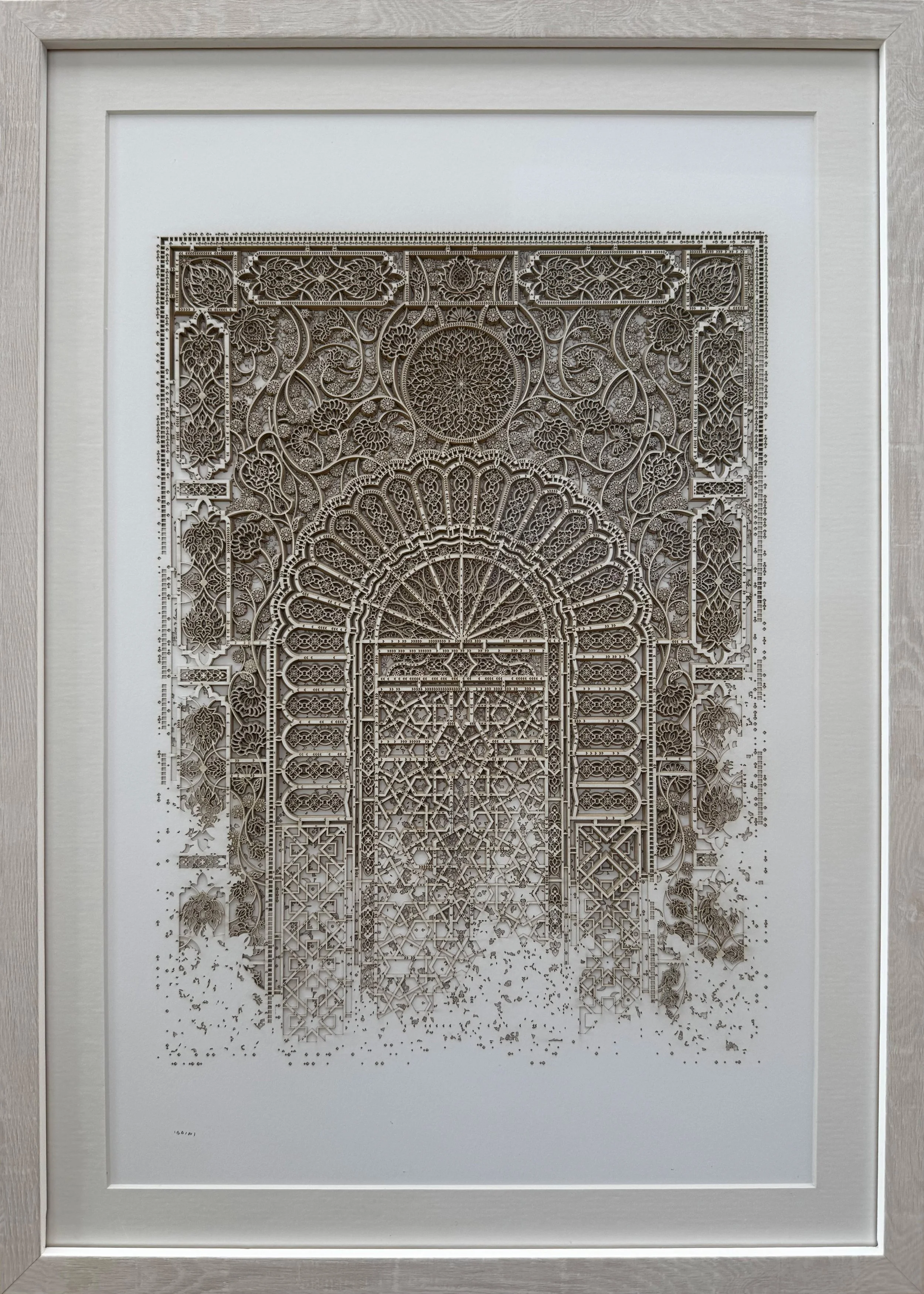 An image of Julia Ibbini’s layered paper work, 'The Sands of Time 8.4', shown here in a wood frame.