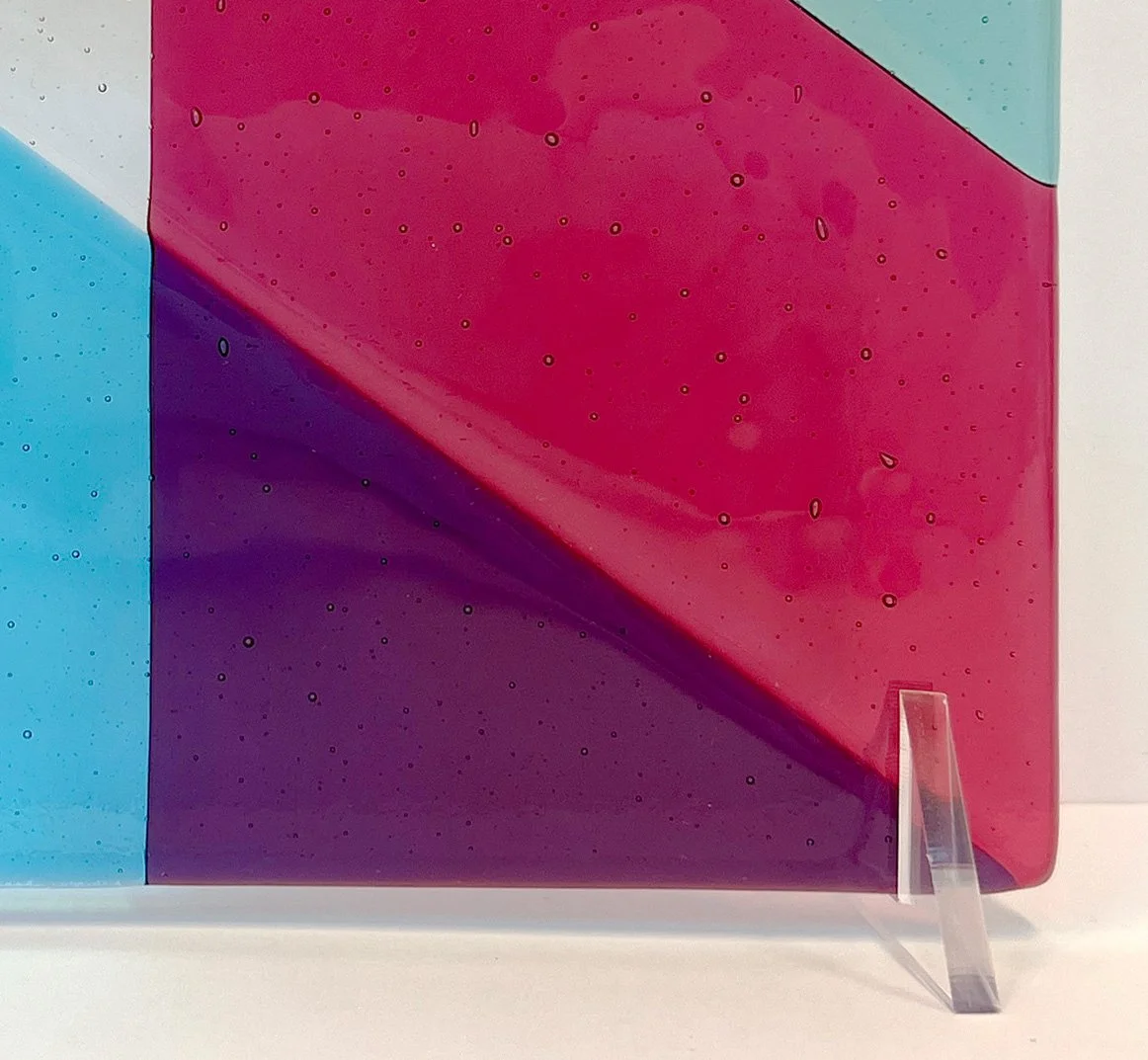 An lower left detail image of Fiona Grady’s handcut and fused glass panel work, 'Intersection III'.