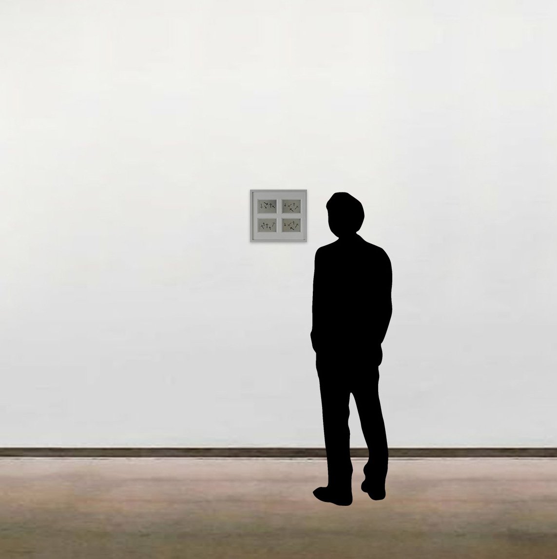 Andy Warhol’s unique Polaroid photographs, 'Crosses', shown here framed alongside a six-foot figure for scale.