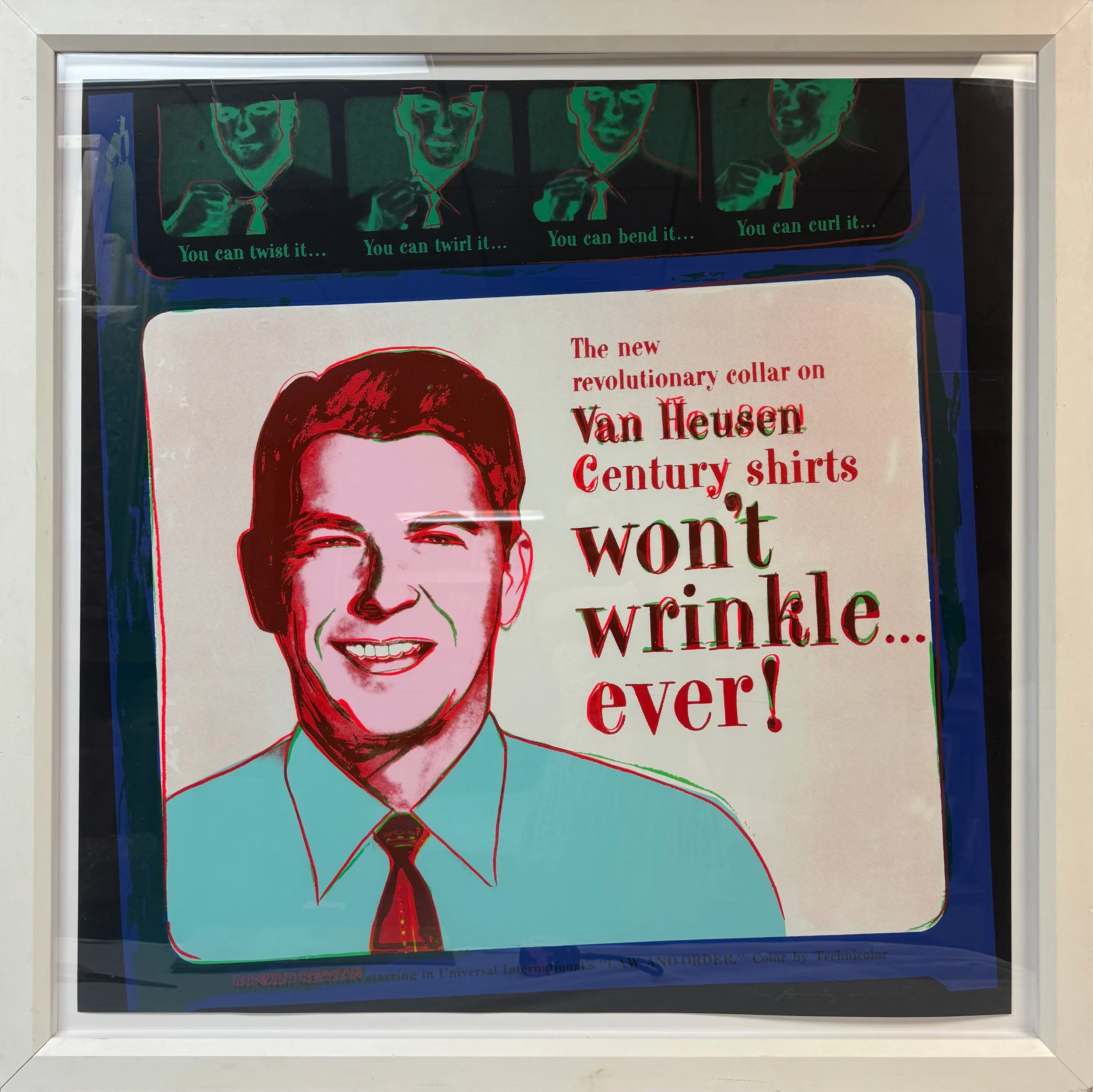 Andy Warhol’s screenprint on Lenox Museum Board, 'Van Heusen (Ronald Reagan)', dated 1986, shown here in a white frame.