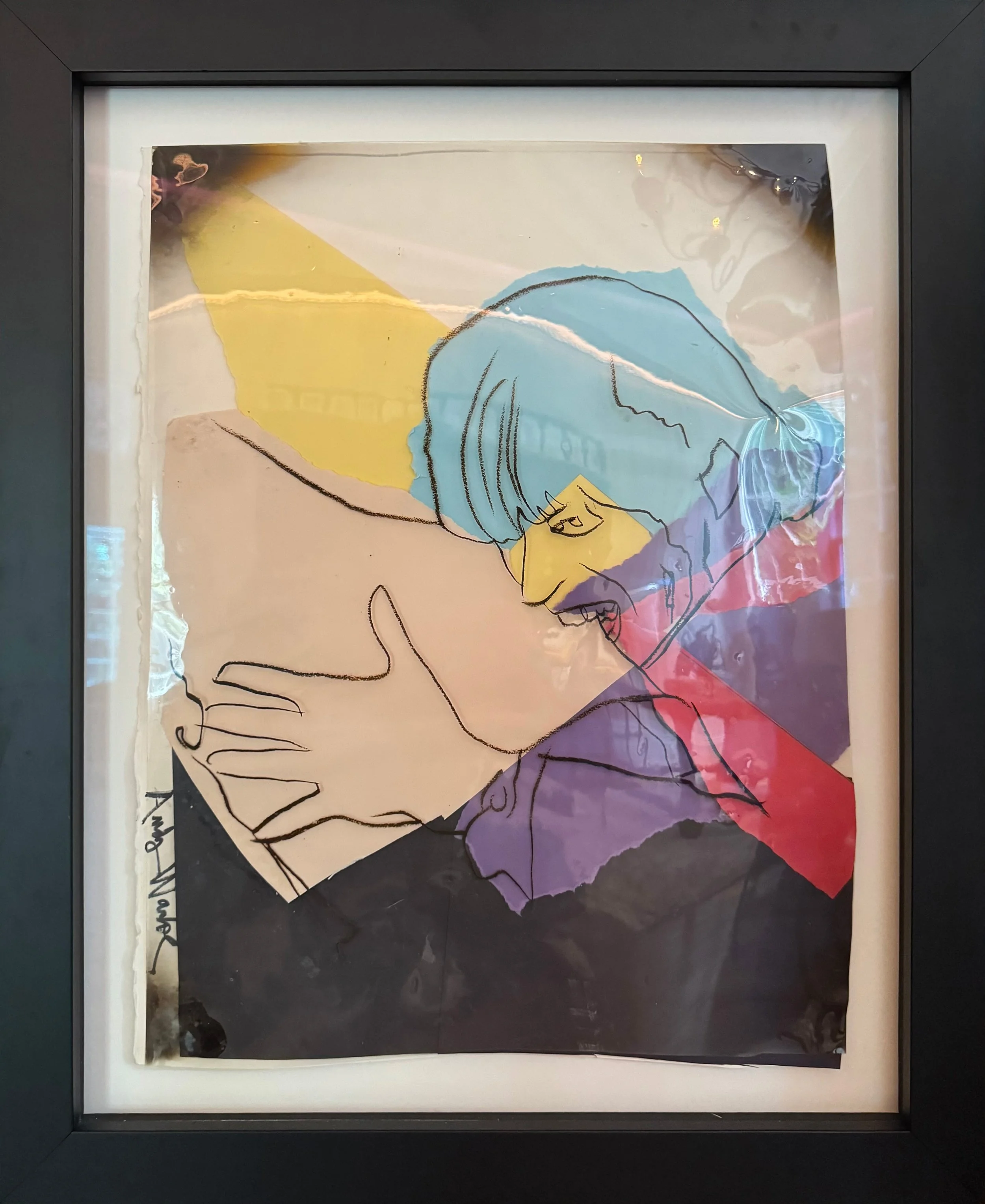 Andy Warhol’s 1977 work, 'Rolling Stones- Love You Live (Charlie Watts and Mick Jagger)', shown here in a black frame. This work is comprised of photo transfer on acetate on colored graphic art paper and construction paper on Arches paper.