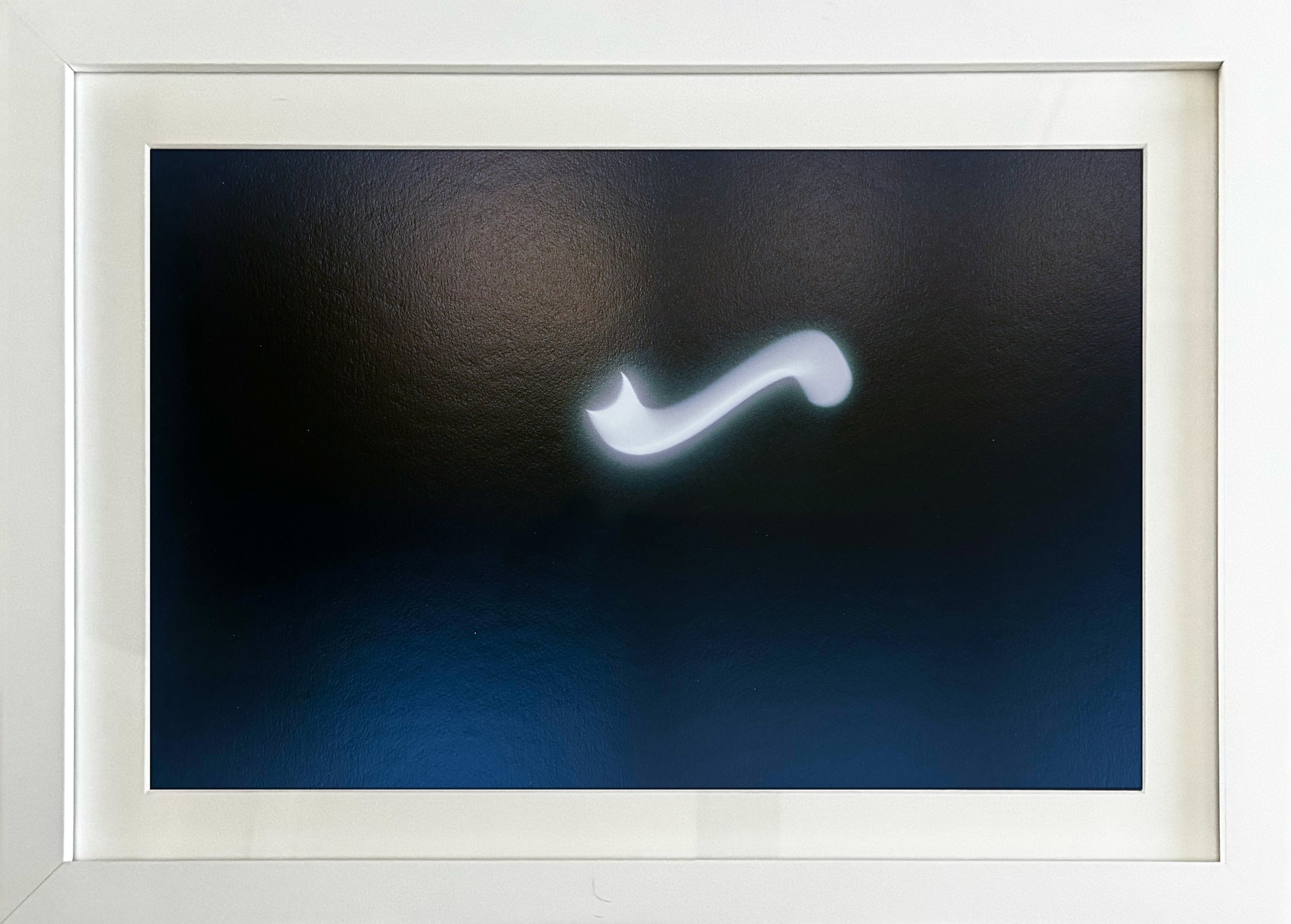 Tacita Dean’s 15-color screenprint, 'Eclipse Drawings #2', shown here in a white frame.