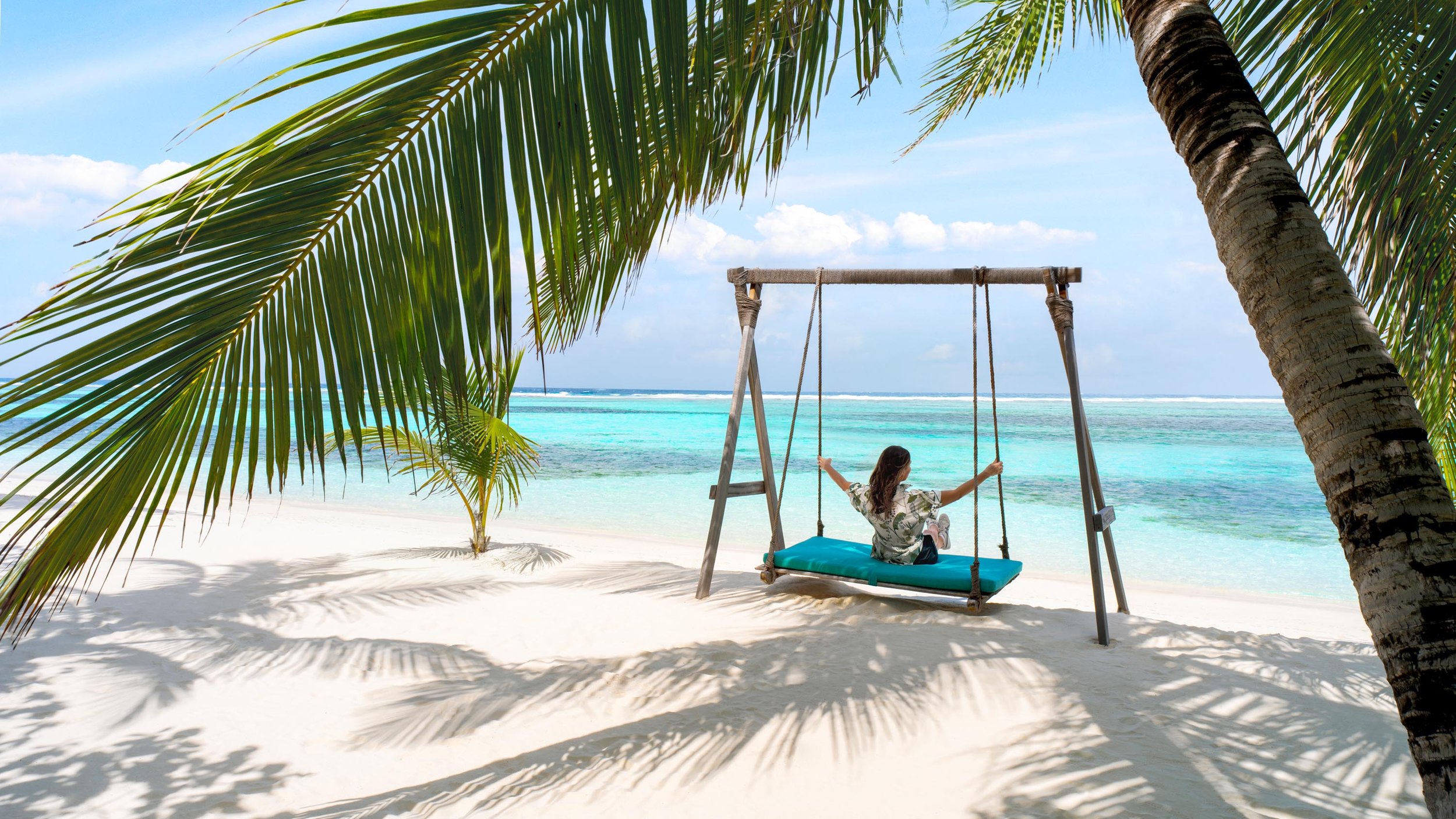 Wellness Beach Swing Overwater Villas Lifestyle 02 V2 16x9.jpg