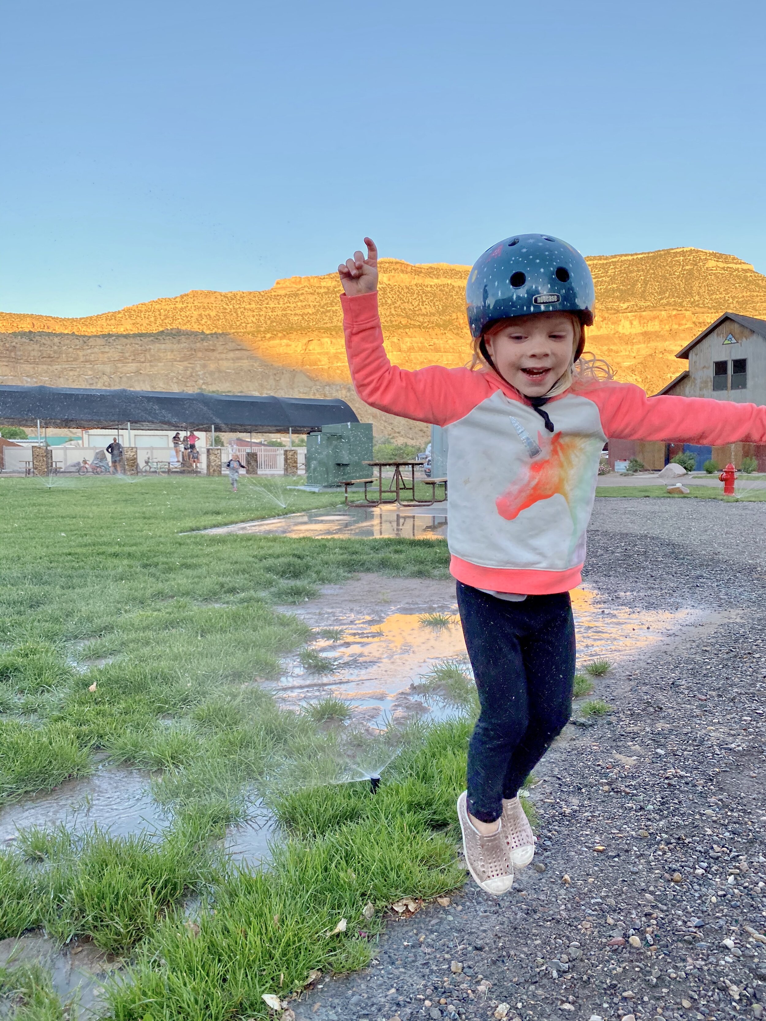 Sprinkler fun, helmet style.