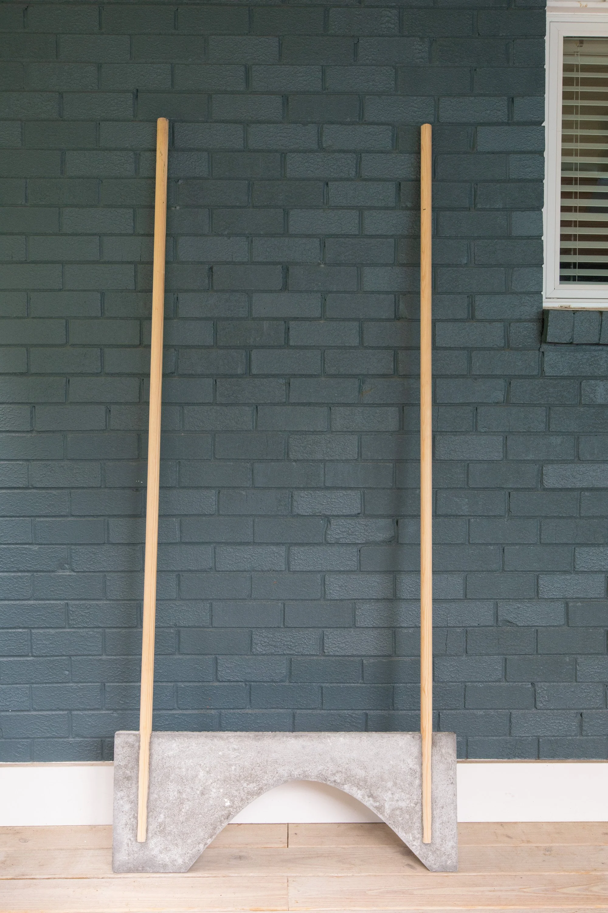  Krista Clark  Congregation , 2025 concrete and wood 81 x 36 x 1.25 in.   