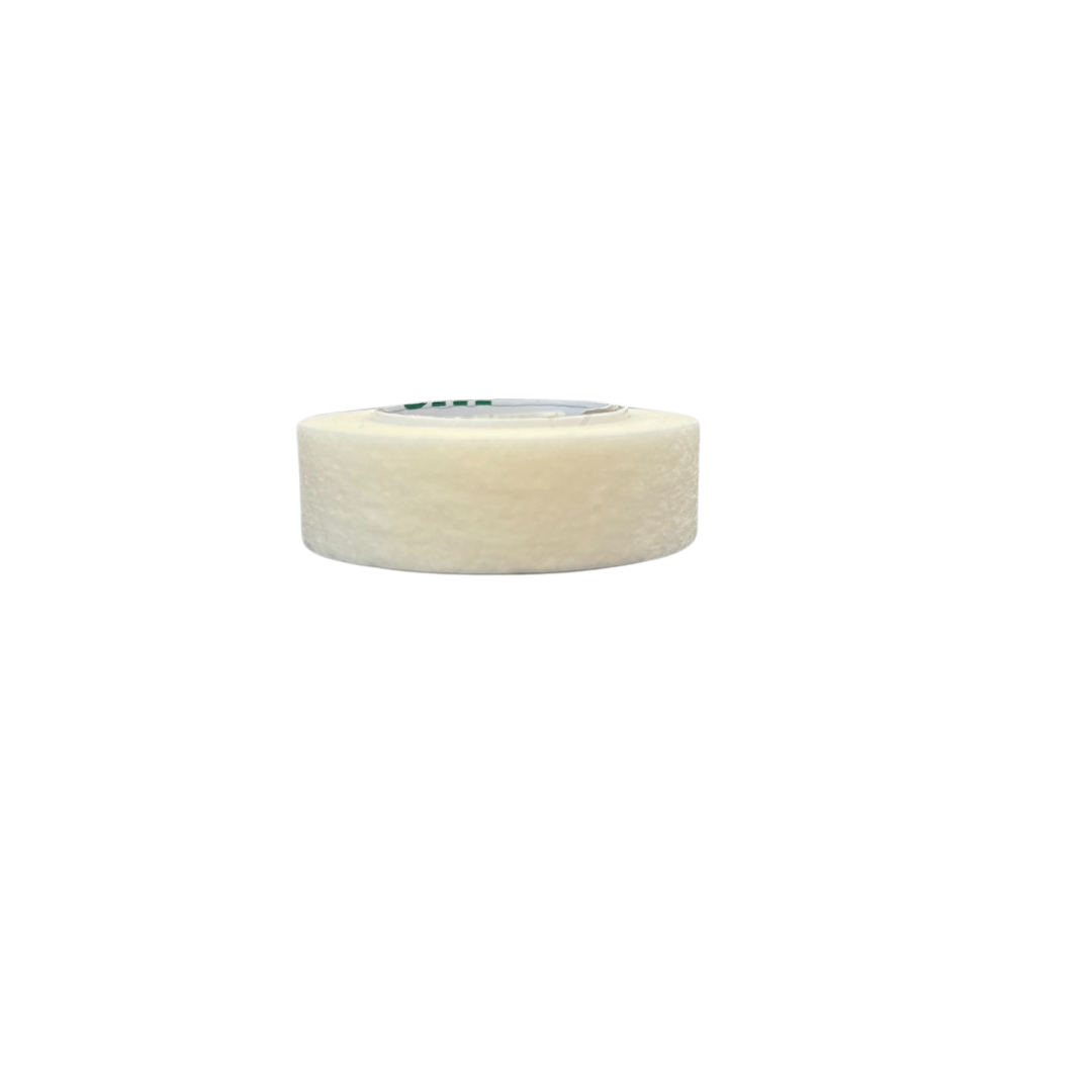MICROPORE TAPE WHITE HALF IN. PERSPECTIVE.png